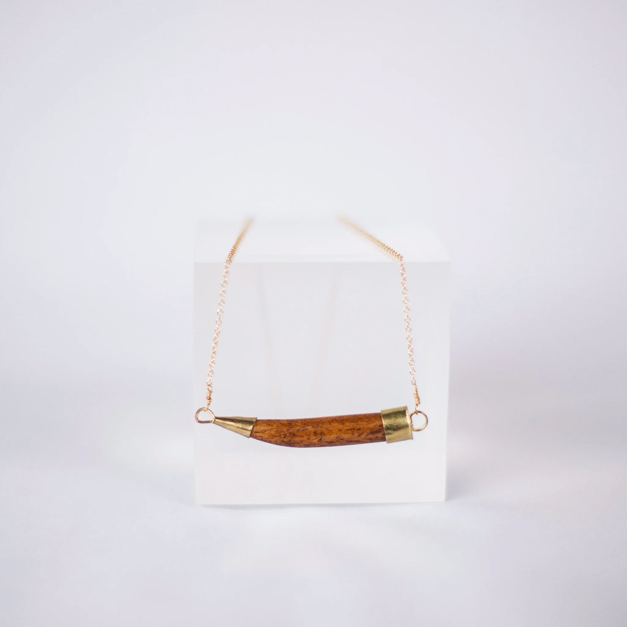 Polished wood horn necklace from Ancora Imparo Jewelry $20 Item #94397