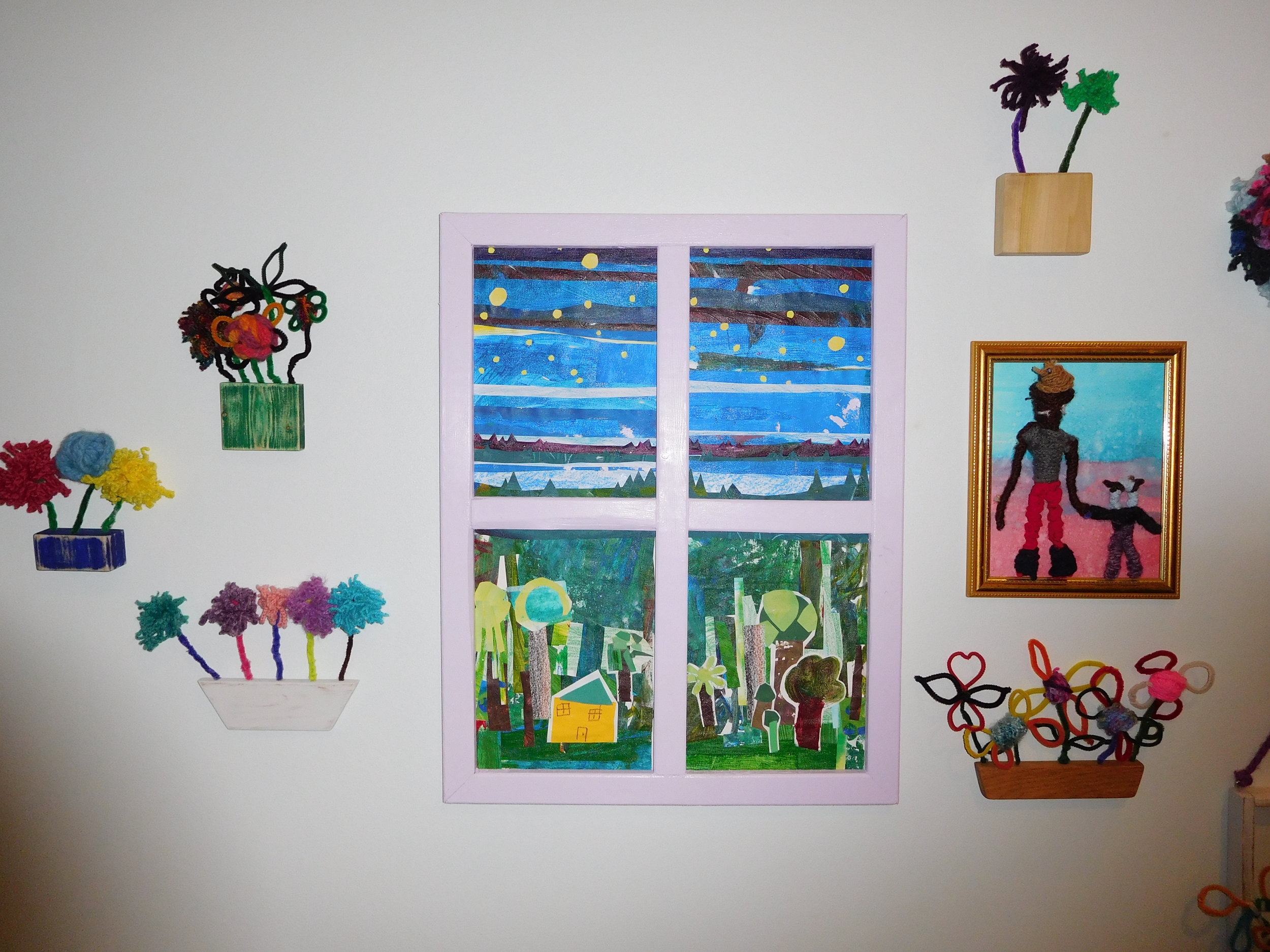 Collaged windows and other NAP summer artworks on display in Gather and Grow.