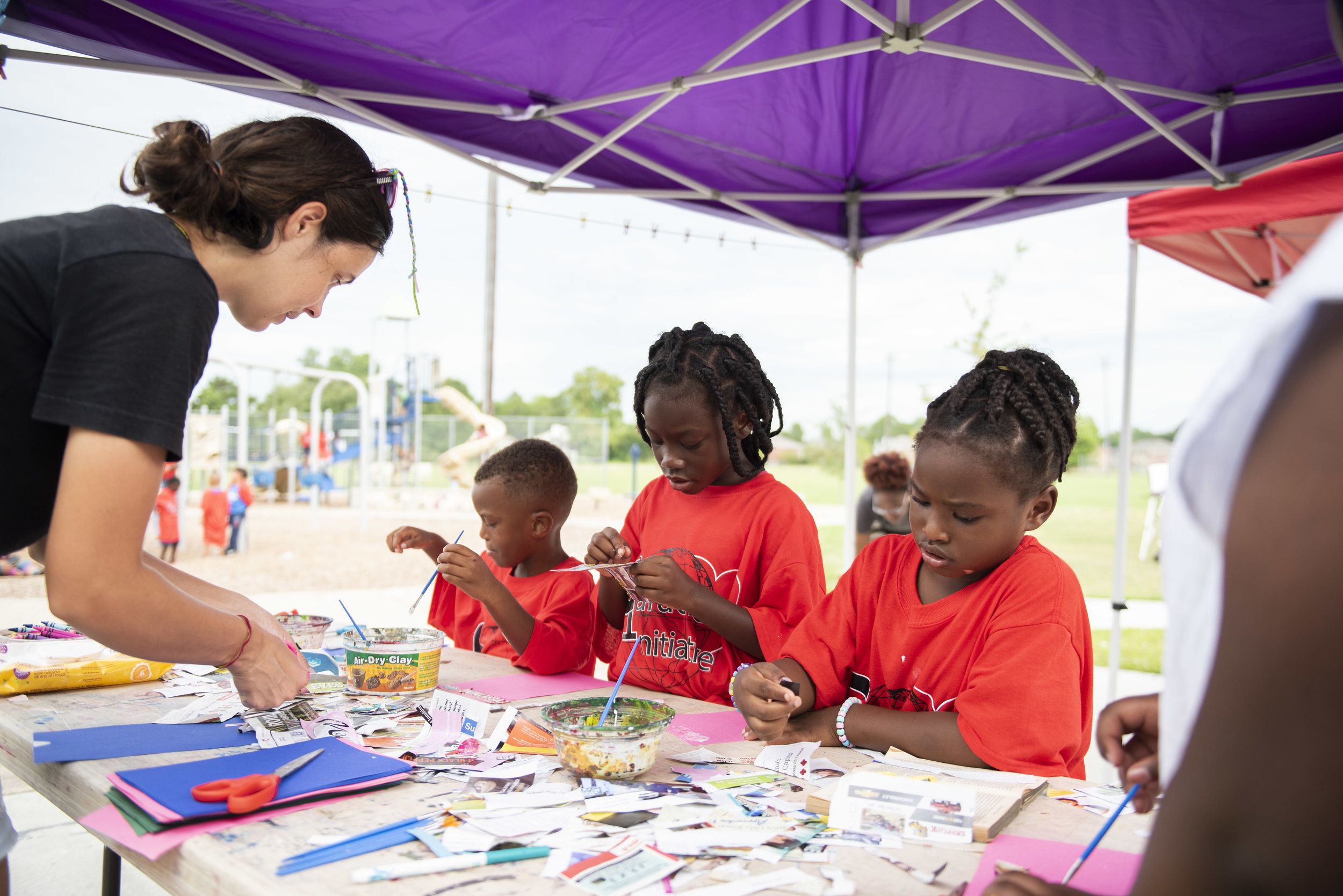 NAP assistant, Samantha Combs, helps kids with art activities.