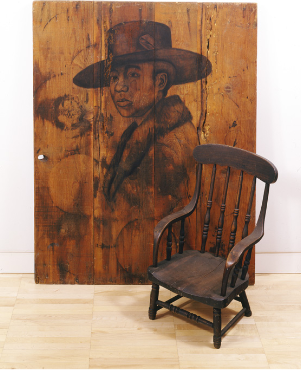 Whitfield Lovell, Cada Dia, 2004, charcoal on wood, chair,  LSUMOA 2021.1 a,b Purchased with funds from Winifred and Kevin Reilly