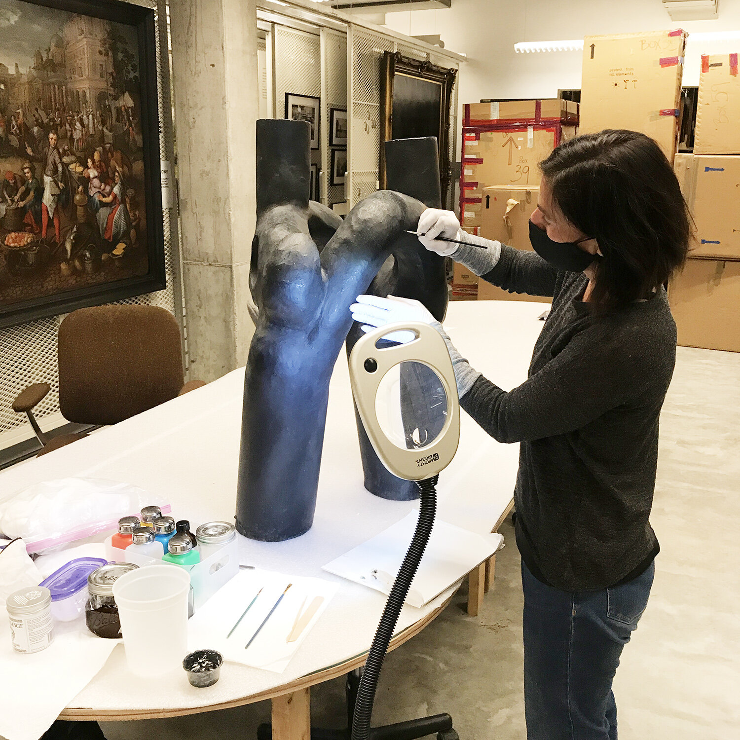  Object Conservator Susie Anders repairing Al LaVergne’s  Untitled  sculpture at LSU MOA. 