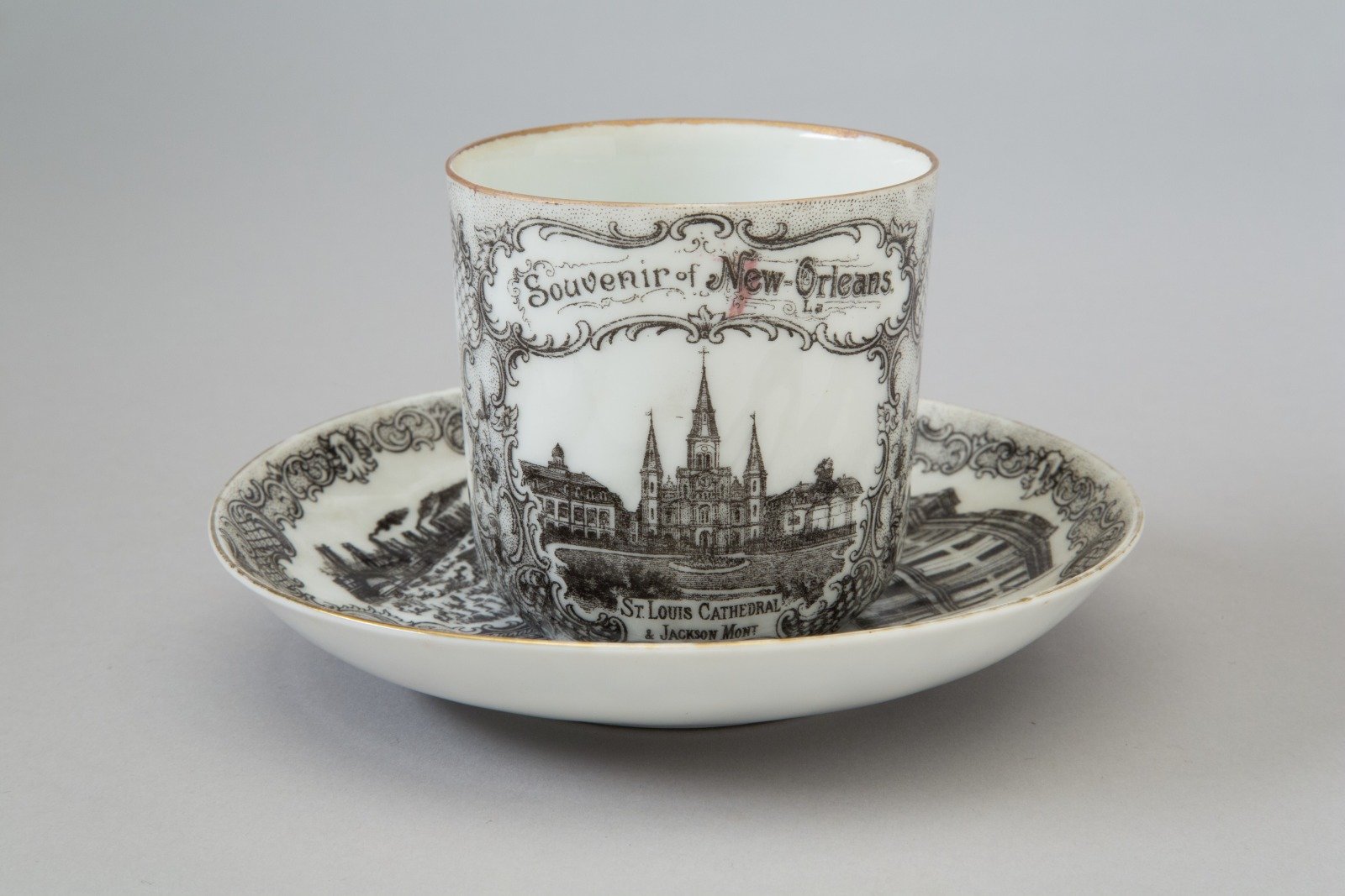   “Souvenir of New-Orleans” cup and saucer  ca. 1910; transfer-printed porcelain manufactured by Victoria Schmidt &amp; Co. (Czechoslovakia)  The Historic New Orleans Collection, gift of Mr. Harold Schilke, 1965.19ab  