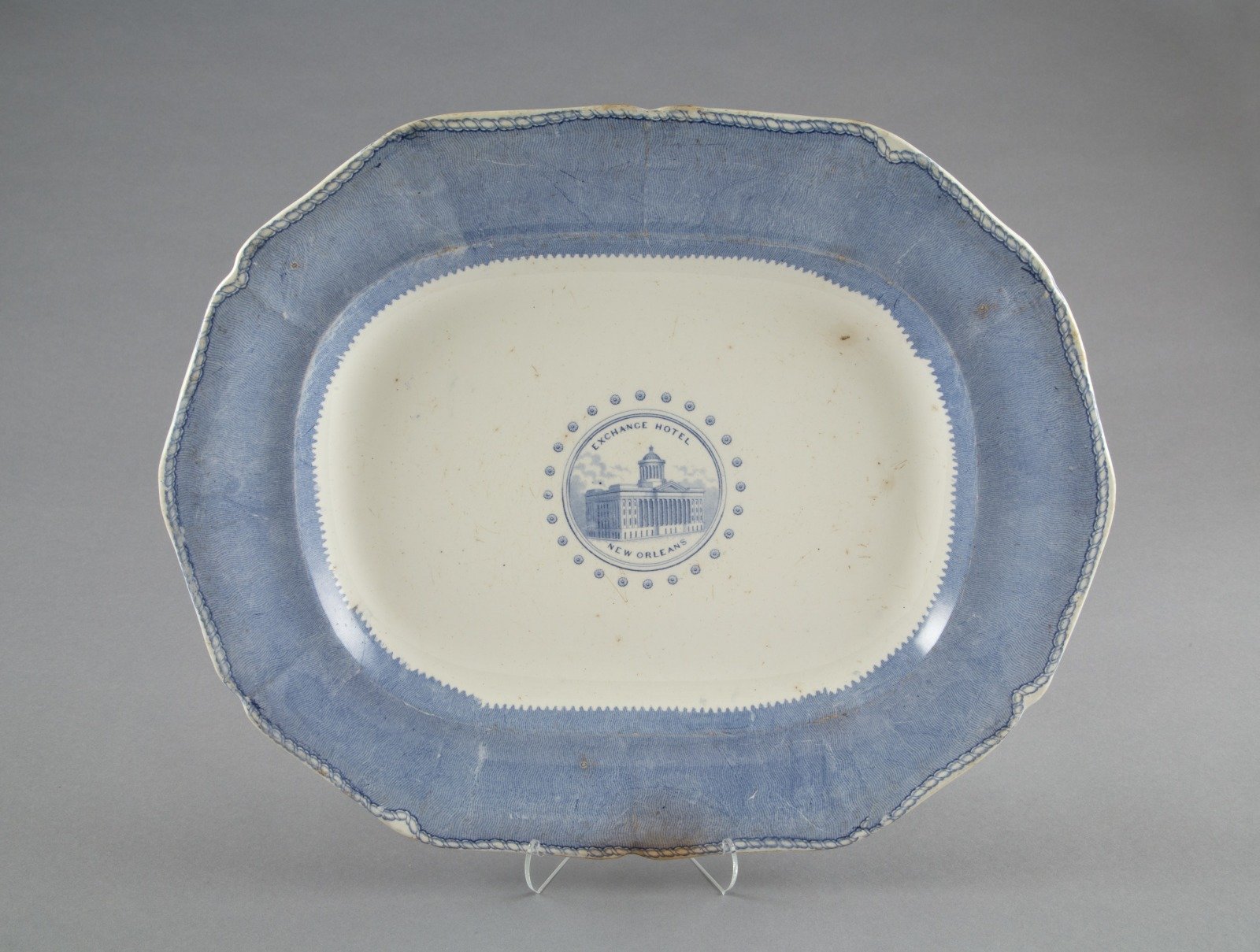   Exchange Hotel, New Orleans platter  1836; transfer-printed earthenware manufactured by Davenport Pottery (Staffordshire, England); retailed by Henderson &amp; Gaines (New Orleans)  The Historic New Orleans Collection, 1977.30  