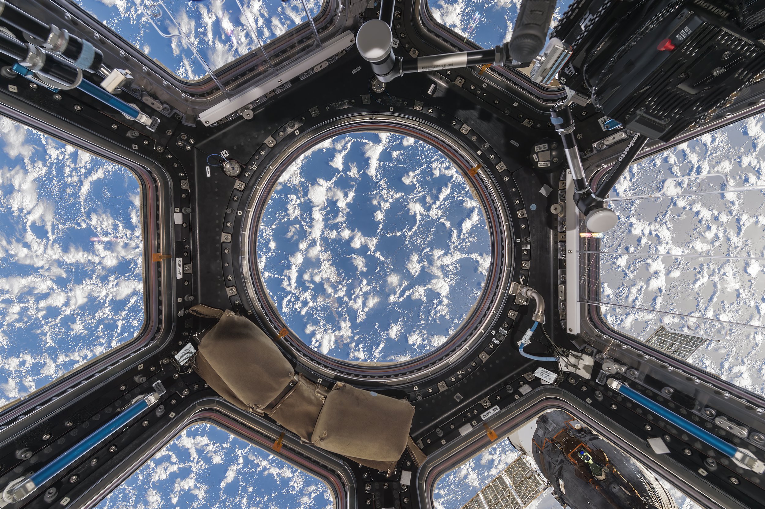  Roland Miller and Paolo Nespoli,  Cupola with Clouds and Ocean , 2020. Chromogenic color print. Courtesy of the artist. 