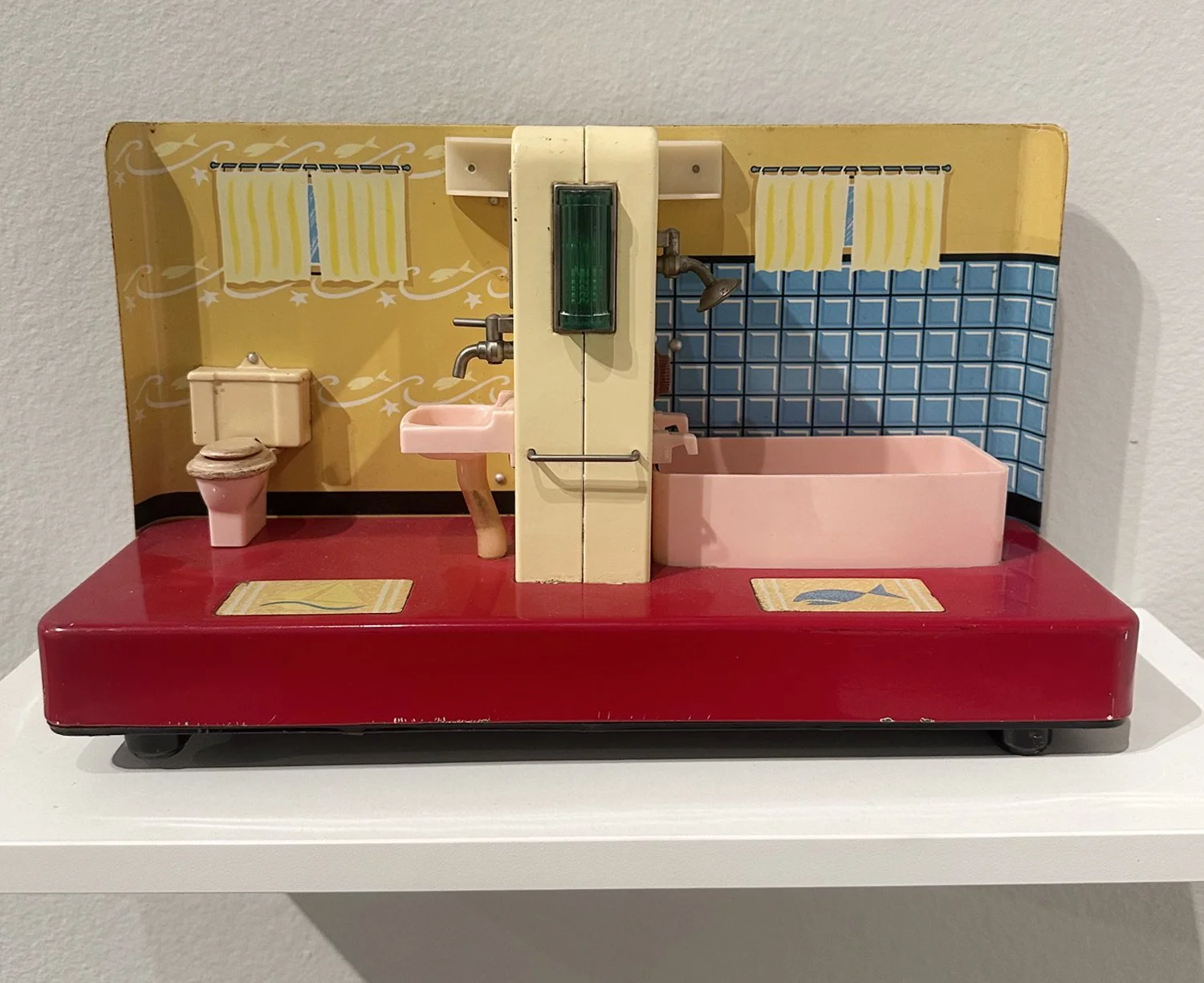 Unknown Artist, Bathroom Scene, undated. Plastic and metal.