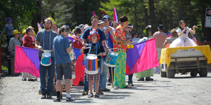  Drummers line up for a return trip at one of the real life parades.&nbsp;In addition to commemorating the parade in clay, I was also one of the parade organizers, building giant puppets and teaching stilt walking. 