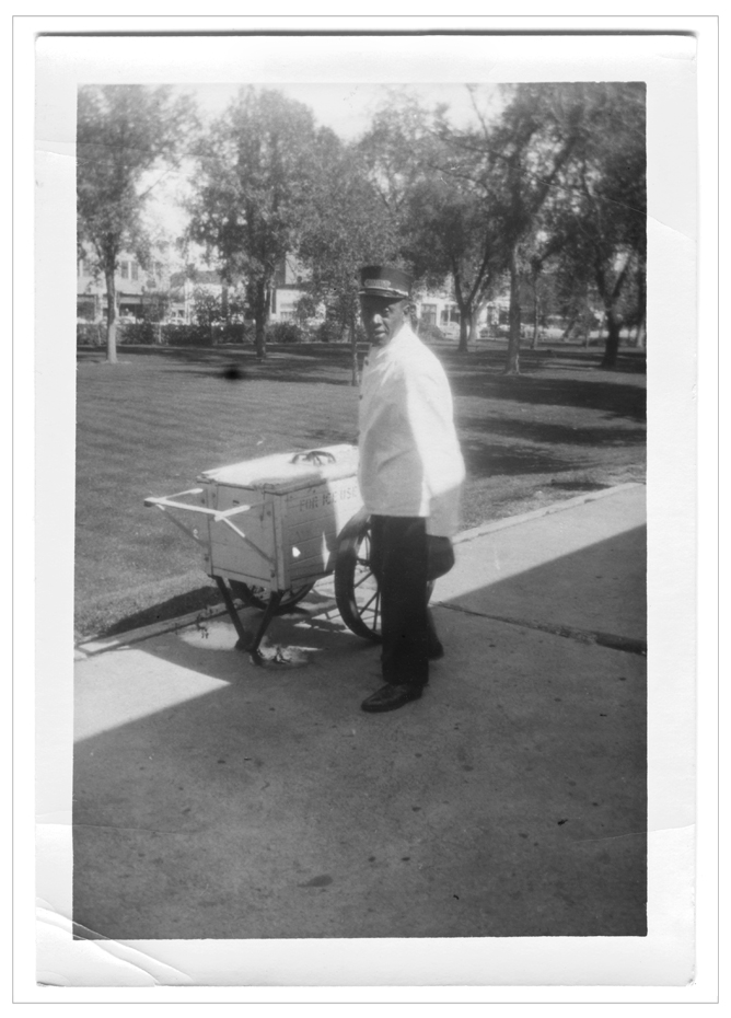 railroad porter with ice cart