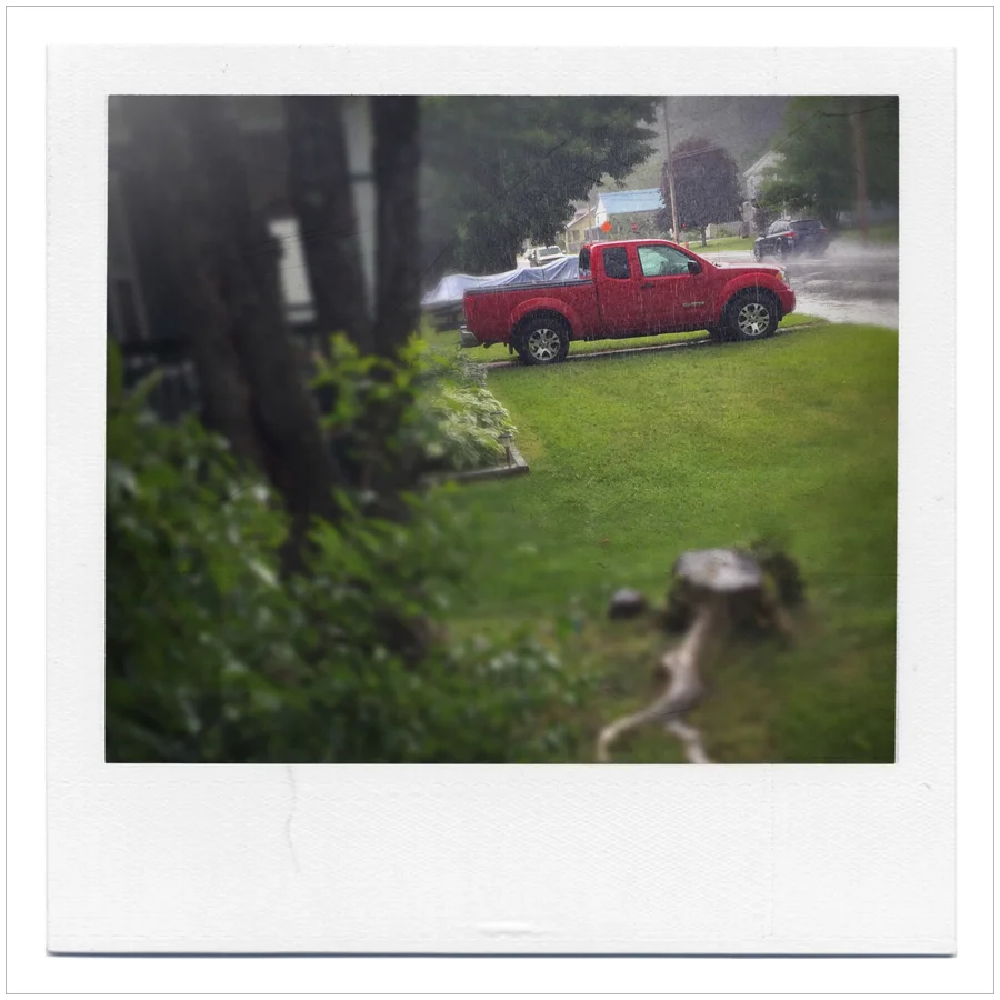 red truck in the rain