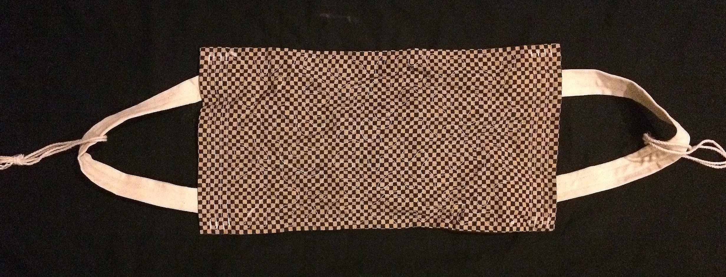 A backstrap sewn out of cloth.