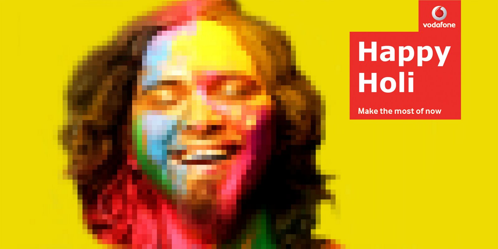 Vodafone In Store Innovation poster_Holi Festval...Colored face in the poster is created with small holi color packs..jpg