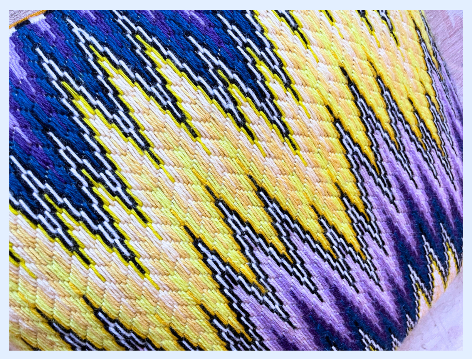 Bargello Flame pillow in Purple and Yellow but Stephanie Oshva, Little O clothing