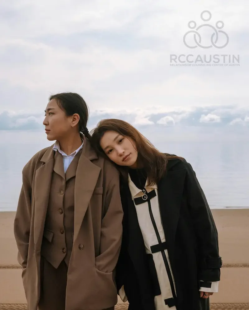 woman leaning on other womans shoulder