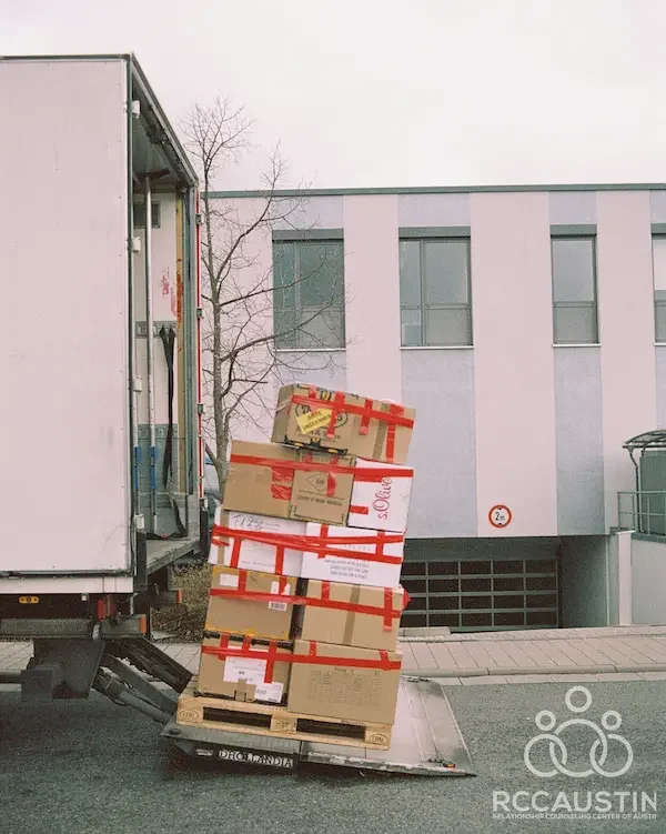 moving truck with stack of boxes
