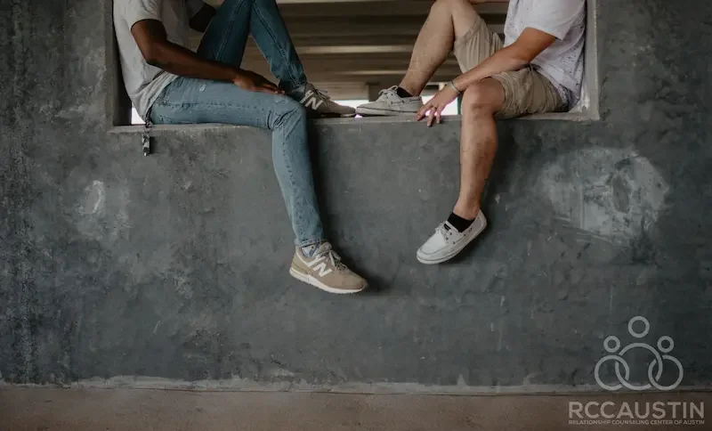 couple talking together in parking garage