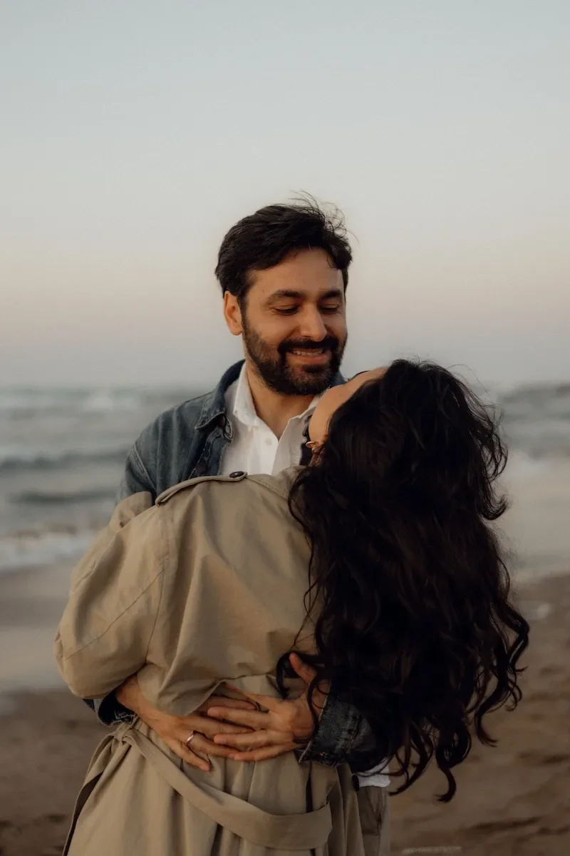couple outdoors at beach embracing