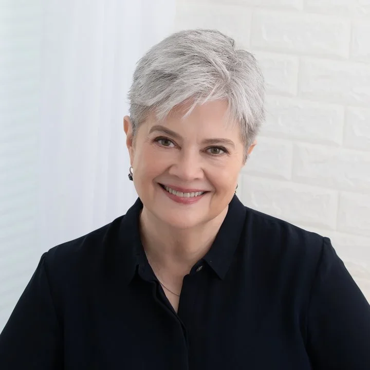 janie mcmahan smiling at the camera