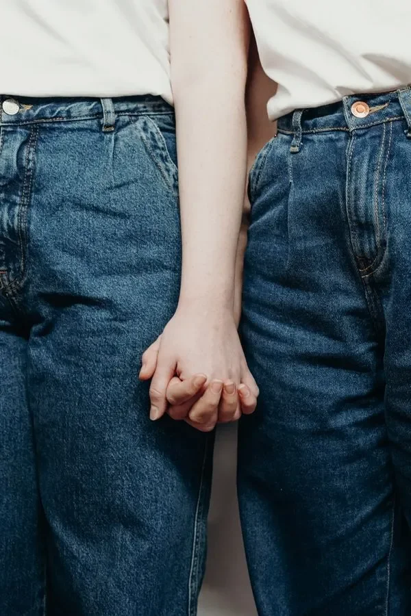 close up of couple holding hands