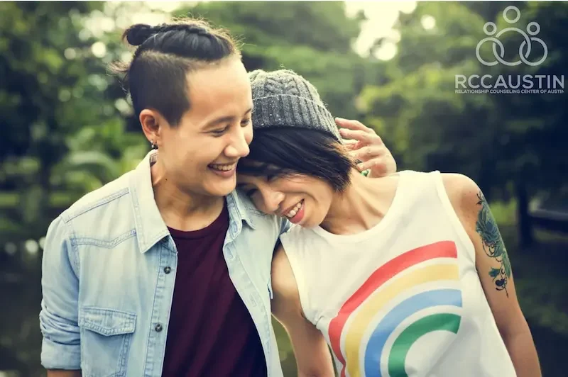 woman leaning on partners shoulder smiling