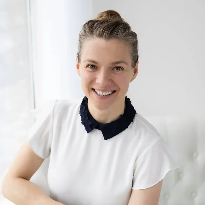 sylvia beligotti in bright office smiling