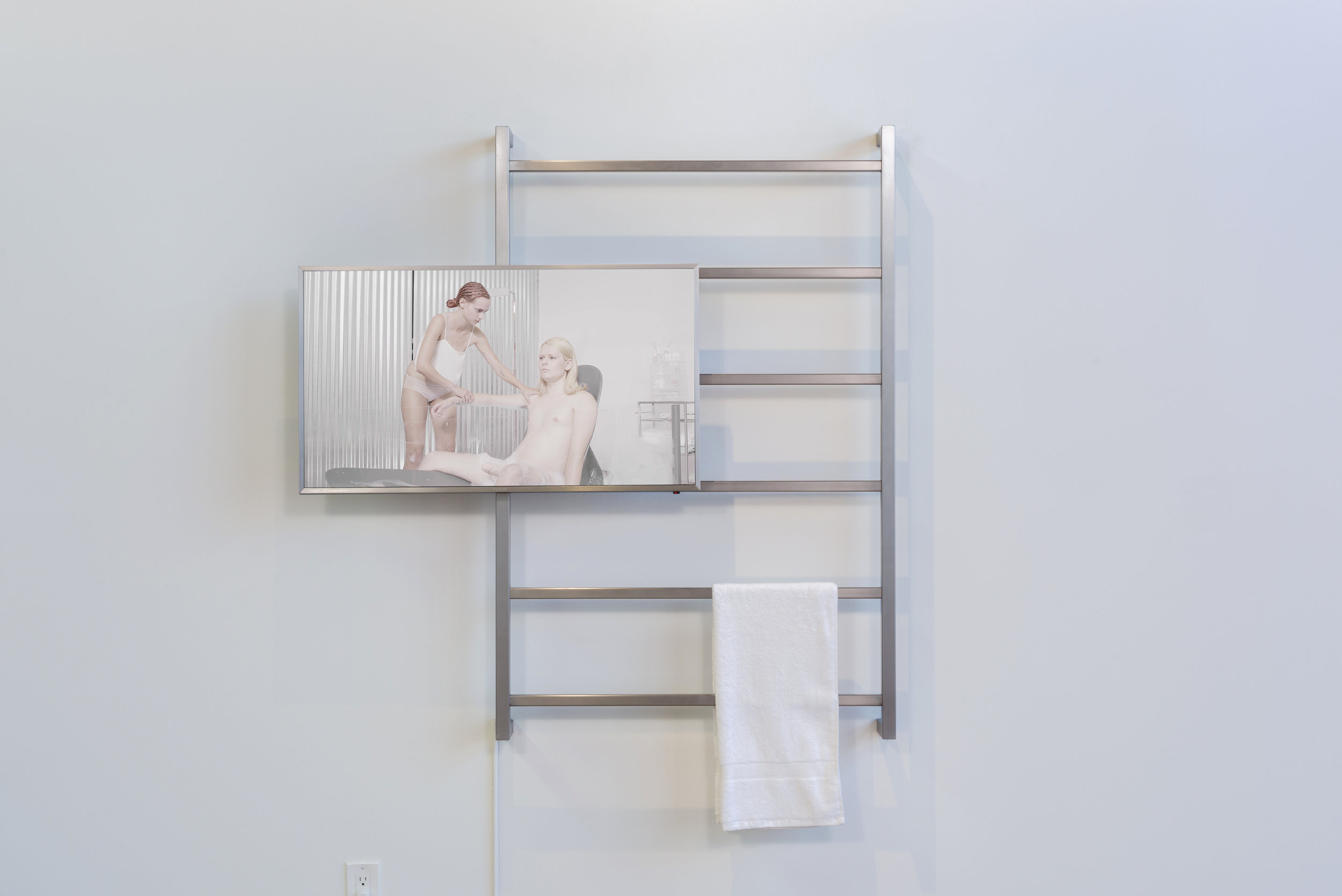   Amanda VIncelli   HYGIENA  2017 Single-channel HD video, brushed steel, towel 6:11, loop, dimensions variable Ed. 5 + 2AP; Unique sculptural edition 