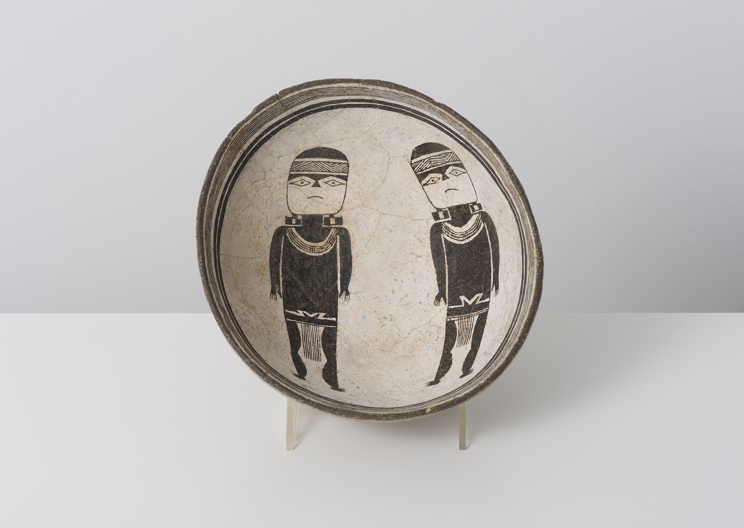   Classic Mimbres Black-on-white  Warrior twins c. 900 - 1000 CE Painted ceramic 6 inches diameter, 3 inches depth    