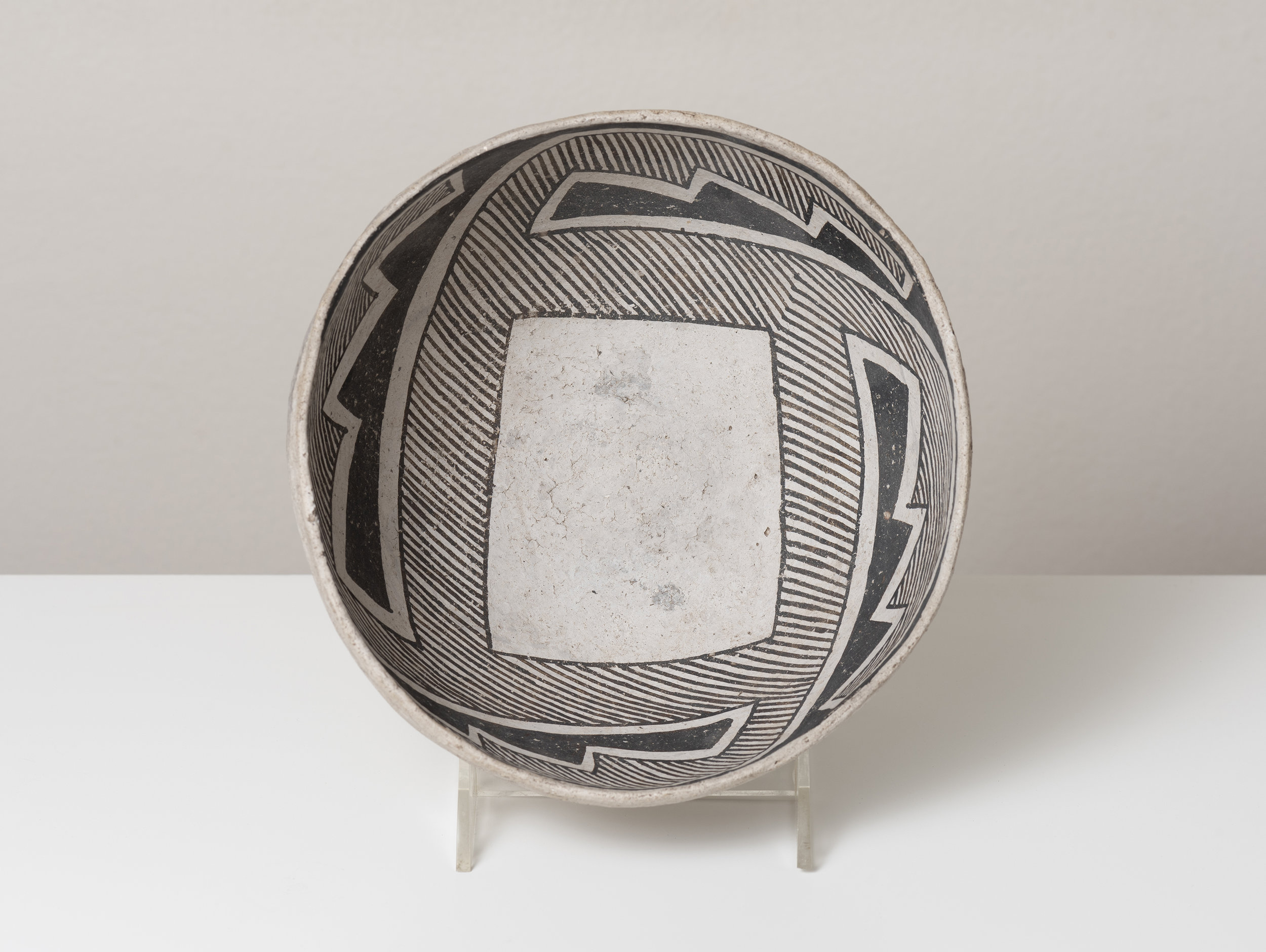   Socorro Black-on-white  Trance portal / directional abstraction c. 1100 - 1300 CE Painted ceramic 7 inches diameter, 4 inches depth 