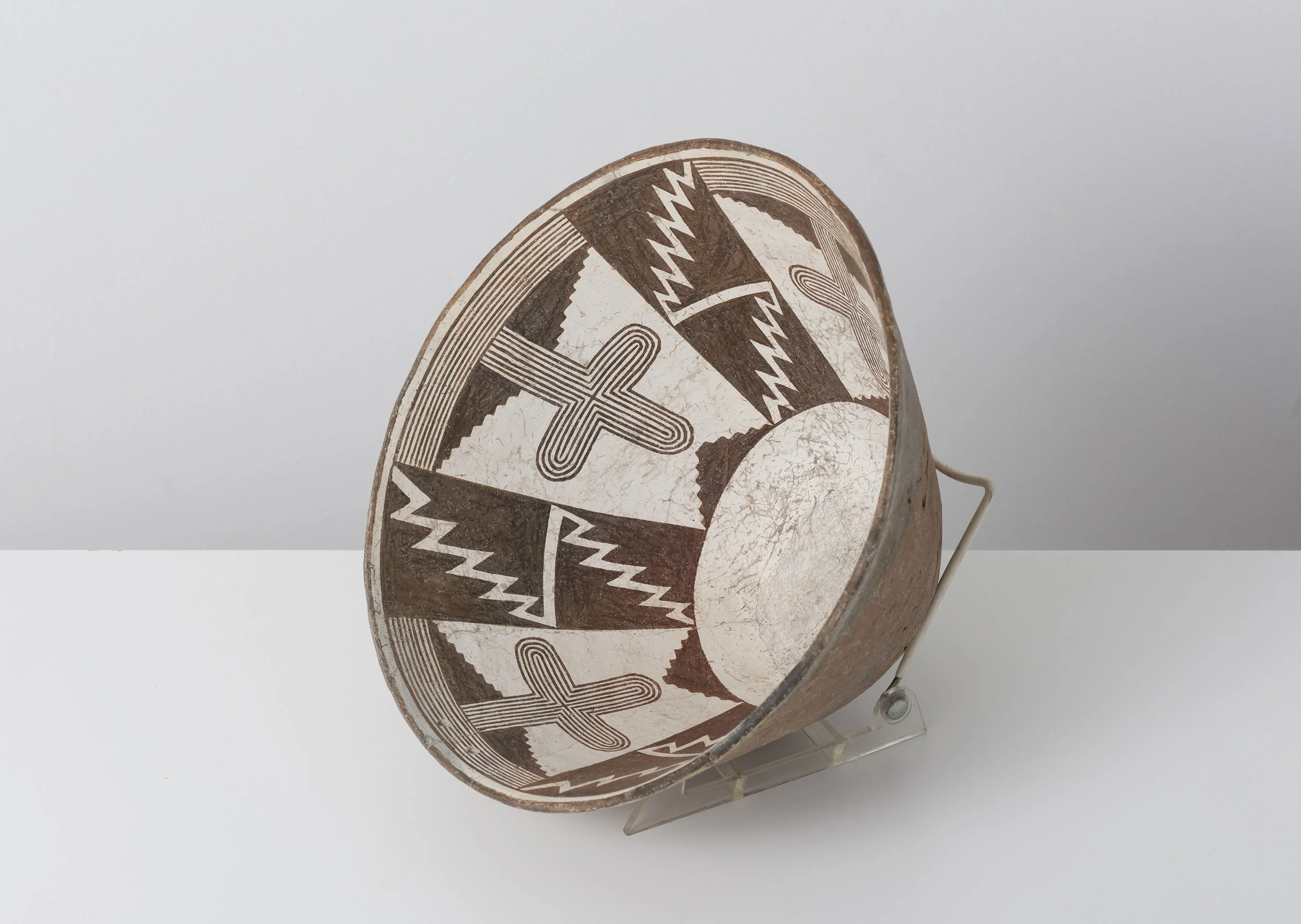 Classic Mimbres Black-on-white Saguaro cactus and entoptic cross pattern c. 900 - 1000 CE Painted ceramic 11 inches diameter, 6 inches depth