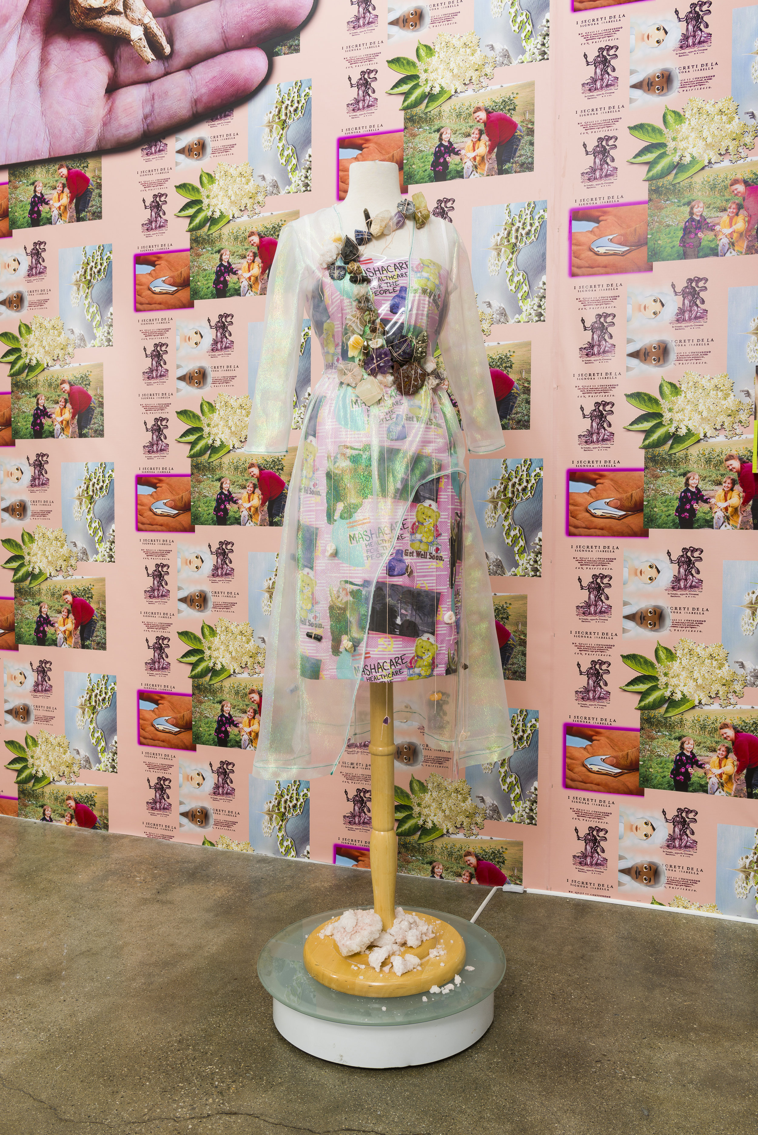 Molly Surazhsky Baba Yaga’s Adornments 2019 Dress form, printed cotton fabric, vinyl, crystals, rotating base, fool’s gold, rose quartz, amethyst, agate, jasper, calcite, crystal points, smoky quartz, pink salt from Searles Lake (San Bernardino), obsidian, sodalite, carnelian, peacock pyrite, geodes