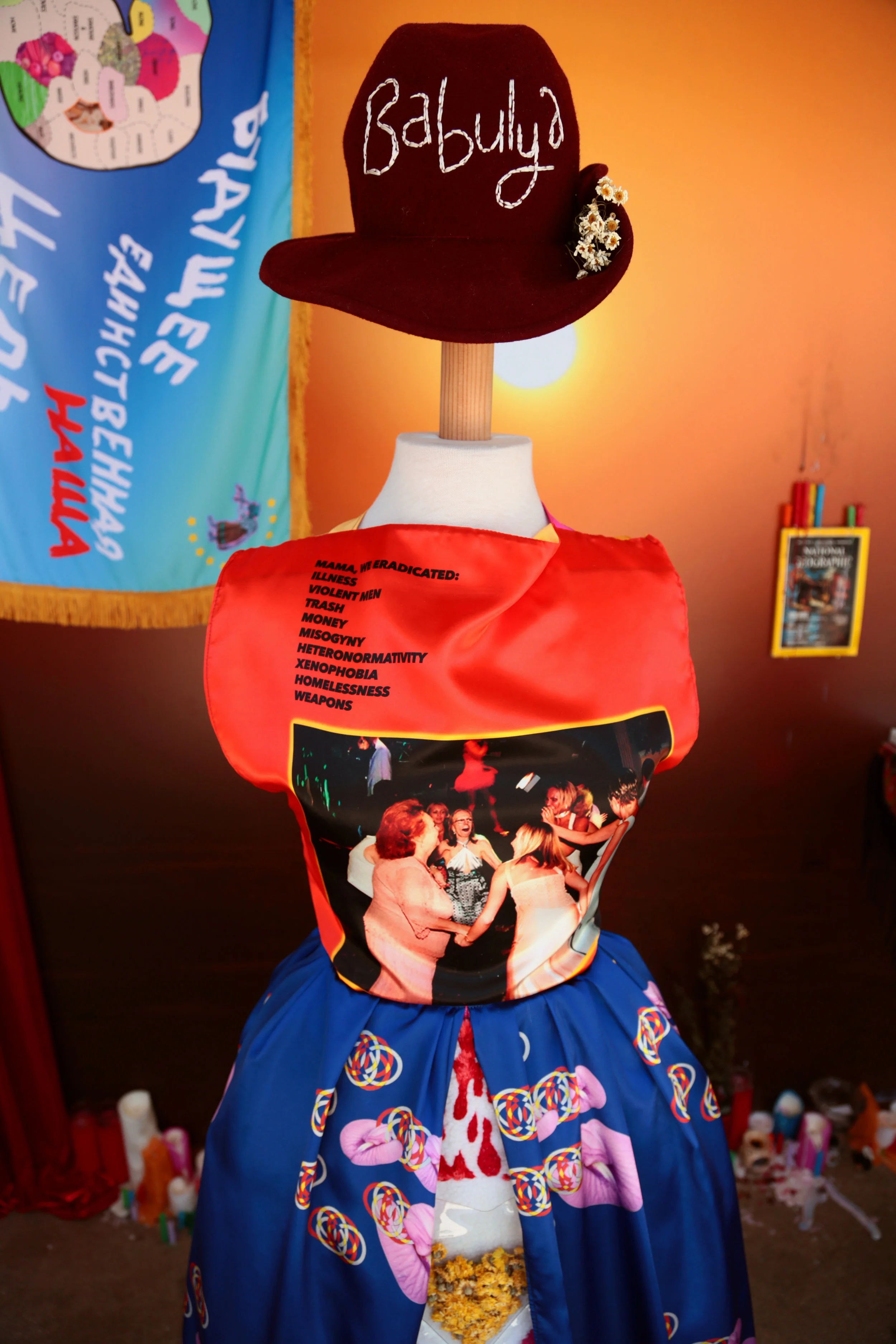 Molly Surazhsky бабуля (Babulya) 2019 Printed satin, canvas, tulle, wool hat, sherpa fleece, gold candles, embroidery floss, chrysanthemum