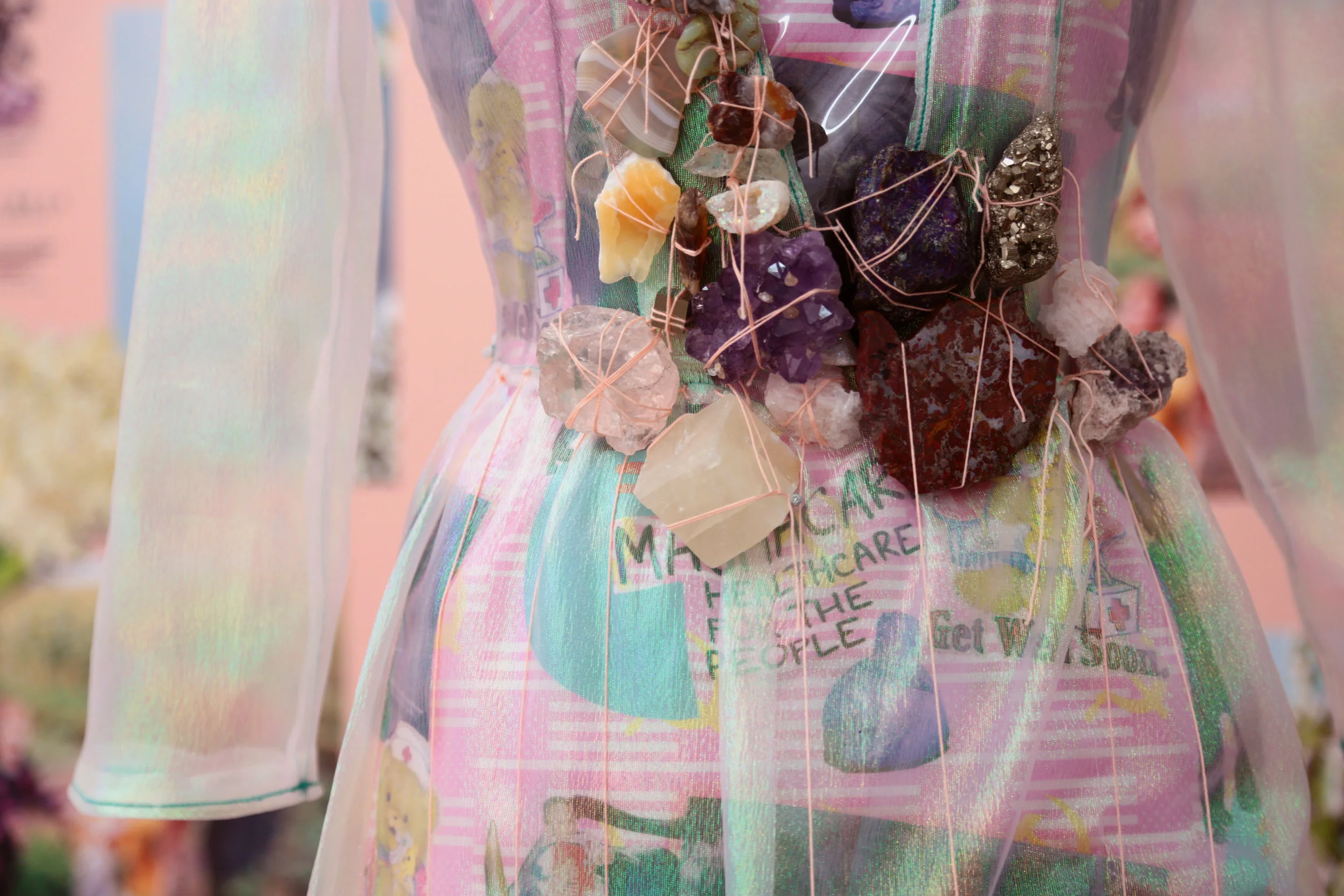 Molly Surazhsky Baba Yaga’s Adornments (detail) 2019 Dress form, printed cotton fabric, vinyl, crystals, rotating base, fool’s gold, rose quartz, amethyst, agate, jasper, calcite, crystal points, smoky quartz, pink salt from Searles Lake (San Bernardino), obsidian, sodalite, carnelian, peacock pyrite, geodes