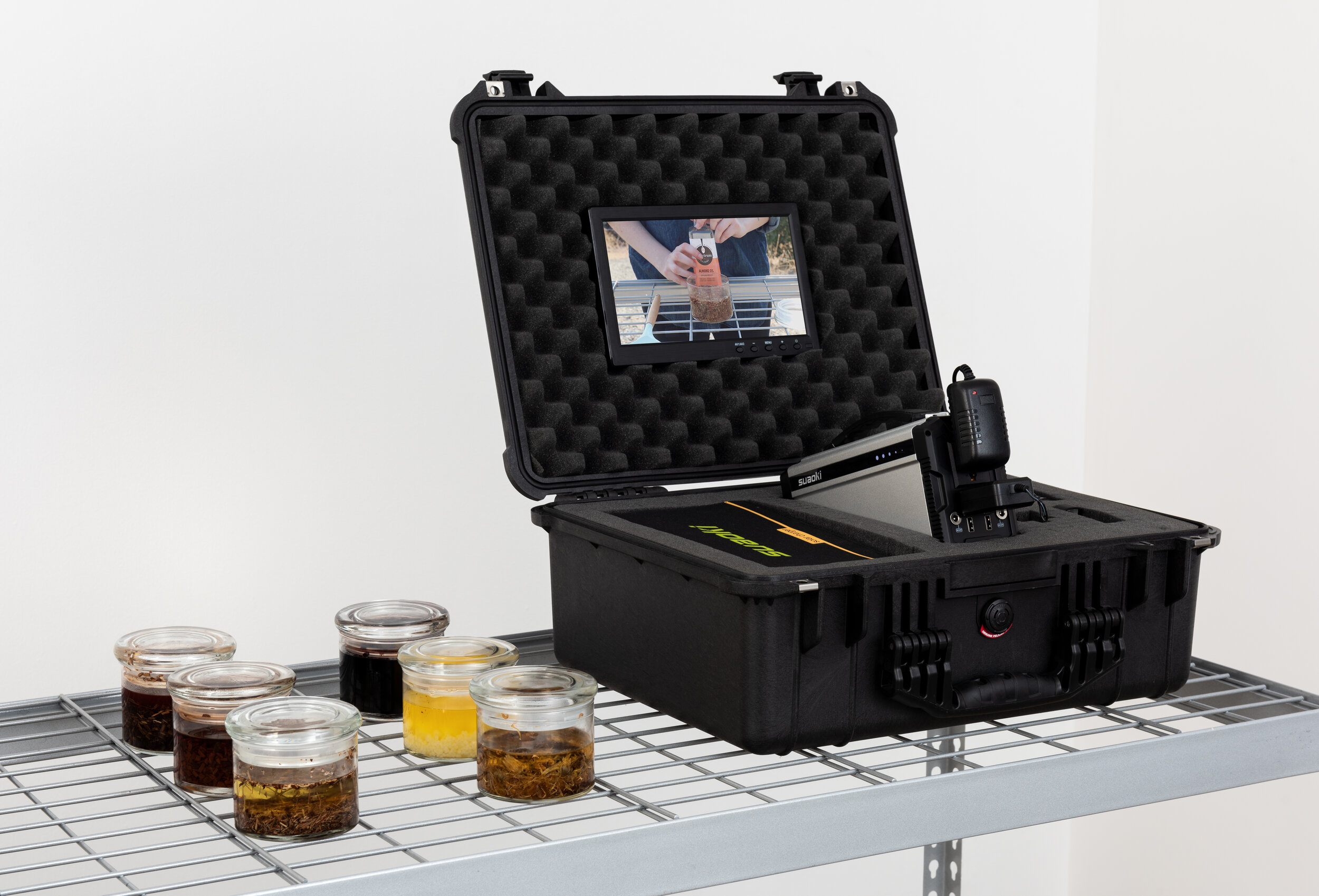   Colleen Hargaden   Capsule Two: Portable Apothecary  2020 HD video, 1550 Pelican case, portable solar panels, portable solar generator, military grade flash drive, media player, 1500 Pelican case, white willow tincture (natural aspirin), elderberry