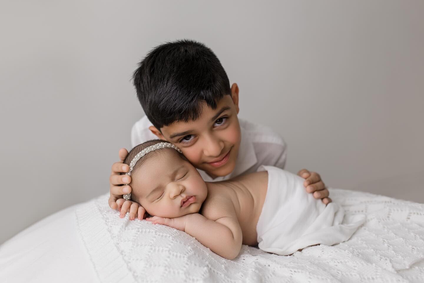 It is recommended to schedule a newborn photography session within the first three weeks of your baby's birth. This is the best time to capture those adorable, peaceful, and curled up poses.

If you plan to have sibling photos taken, make sure to pre