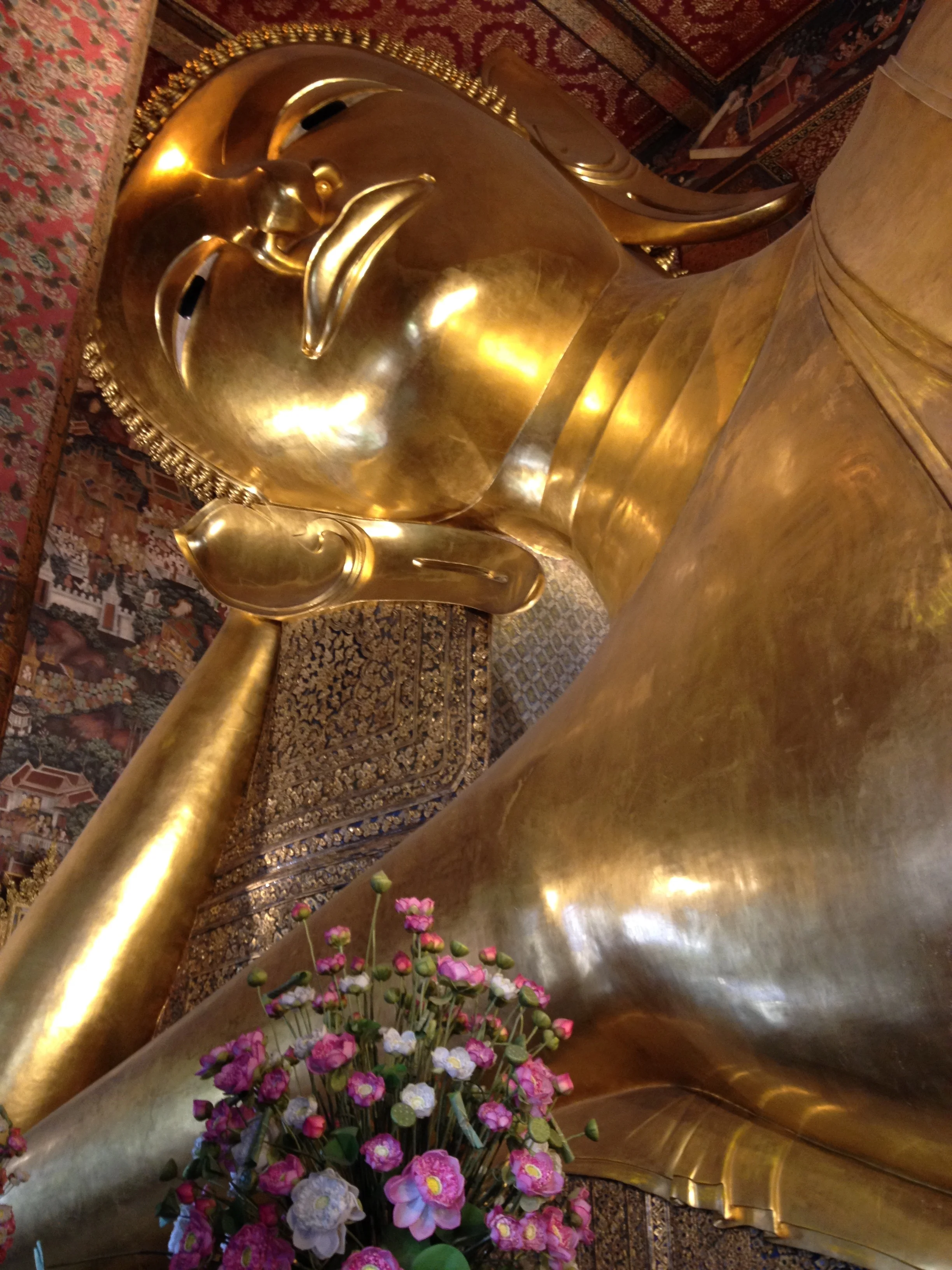 You've got your sitting Buddha, you're walking Buddha, your reclining Buddha, and your standing Buddha. This is from Wat Pho. Guess which one this is.