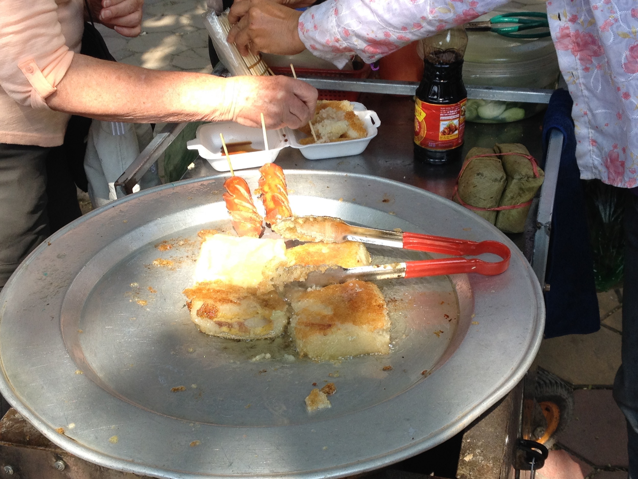 Mmmmm. Street food, in this case, fried rice cakes. Yum!