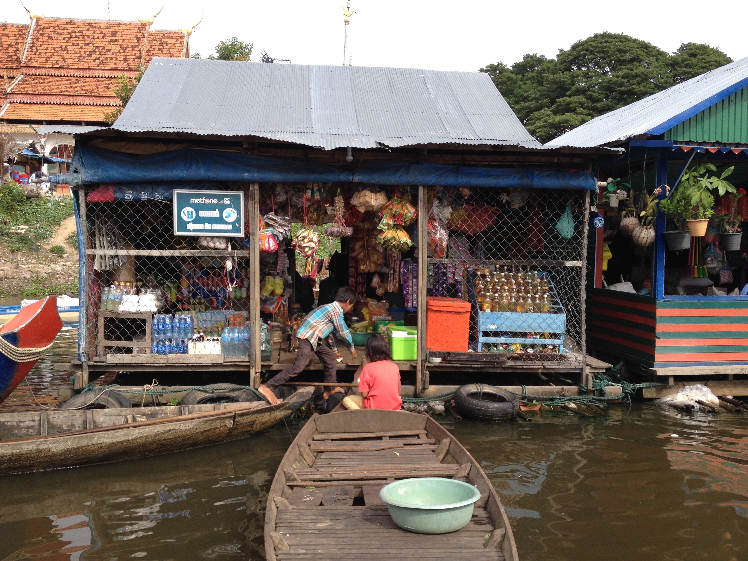Although there is so much similarity between the other emerging countries we have seen, our visit to the floating villages provides a more unique (Cambodian) experience. Everywhere, the air is permeated by the smell (stench) of fermenting fish sauce, an essential ingredient in a lot of dishes throughout these countries. With perhaps the exception that they now use rows of car batteries to power their TVs and cell phones, these river dwellers live pretty much as their ancestors did for a thousand years before them.