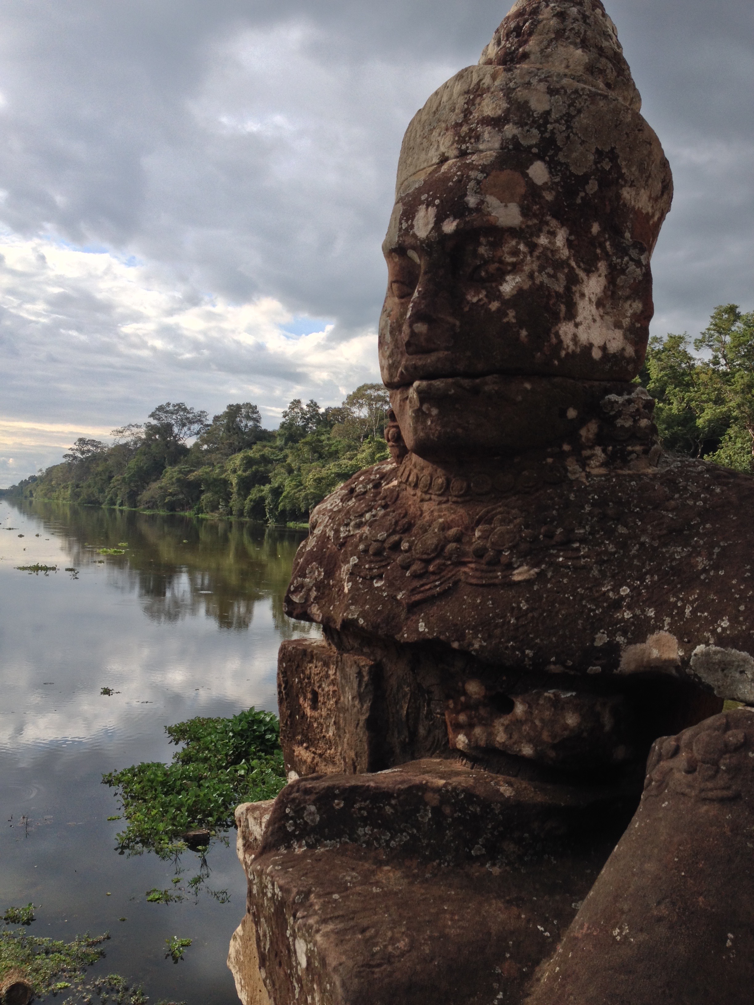 The south gate of Angkor Thom, the capital city of the Khmer rulers, on our way to visit Bayon temple.