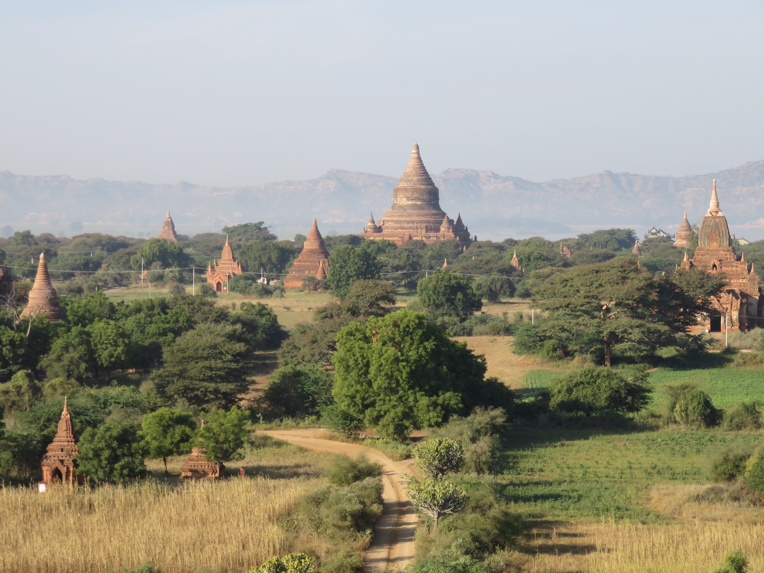 Leaving the big city of Yangon behind, we fly to Bagan, which should be a shoe-in to become a UNESCO World Heritage site (it's currently under consideration by the organization). The best word that comes to mind to describe the rural landscape dotted with the thousands of ancient pagodas and stupas of Bagan is "magical". We are here for 3 days and nights but wish we could linger here for at least a week exploring the ancient temples by riding bicycles along the hard pack dirt roads that crisscross the countryside.