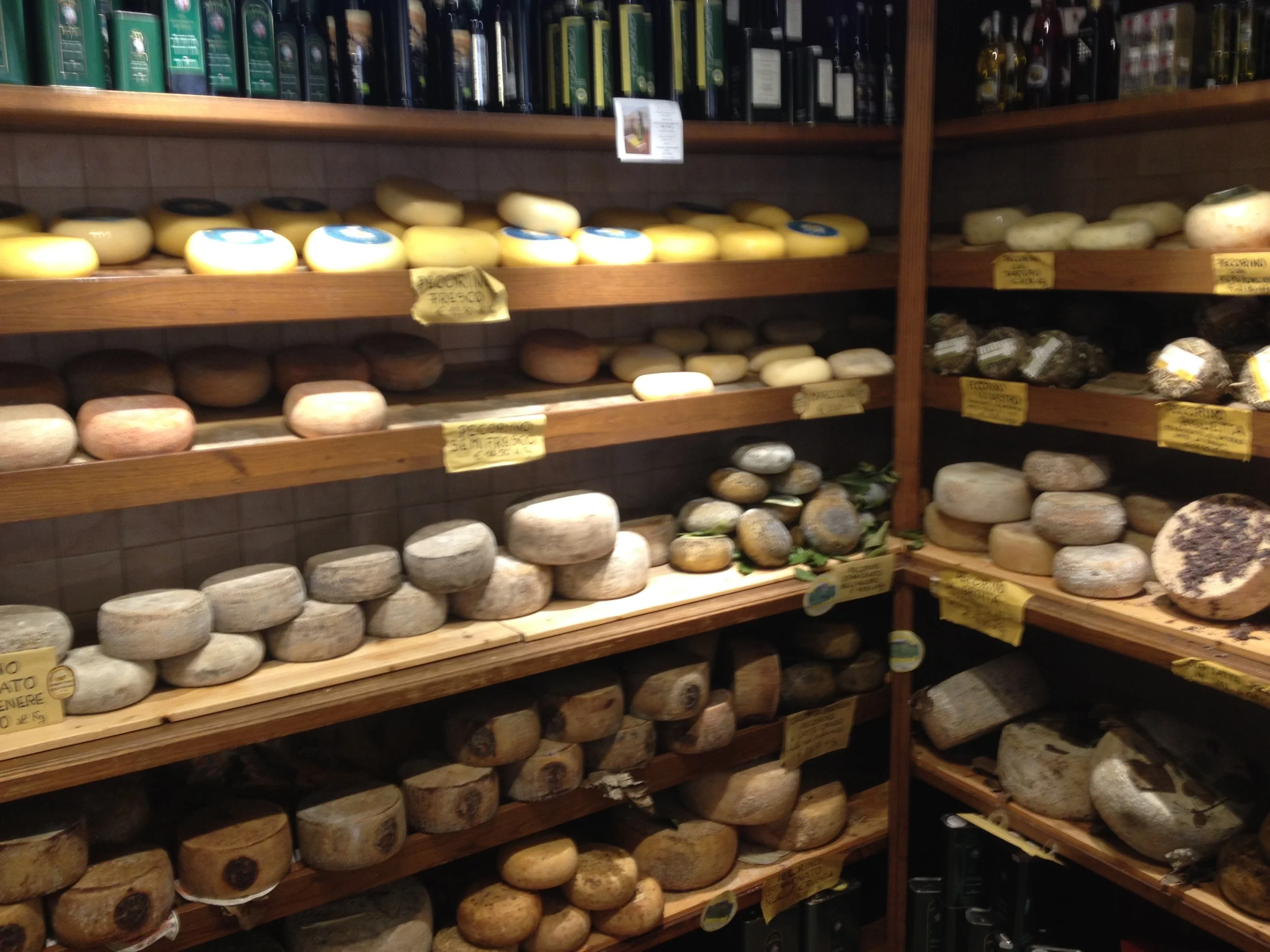 Say cheese! It's impossible not to succumb to snacks of cheese and bread when there is so much of this good stuff around you all the time. One open-air market vendor had at least a dozen different kinds of pecorino cheese. We bought a big wedge of o…