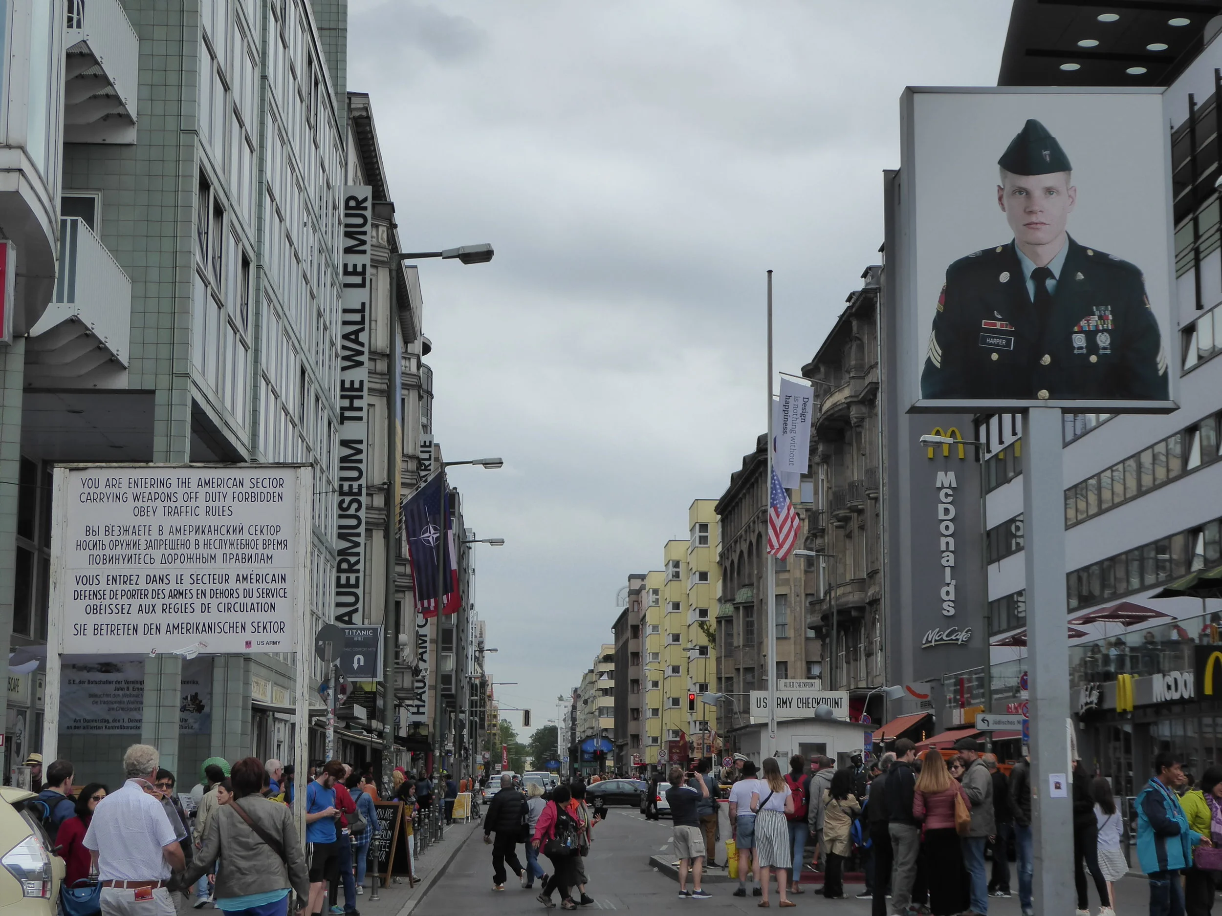 Checkpoint Charlie, now a crowded tourist mecca with a carnival-like atmosphere.