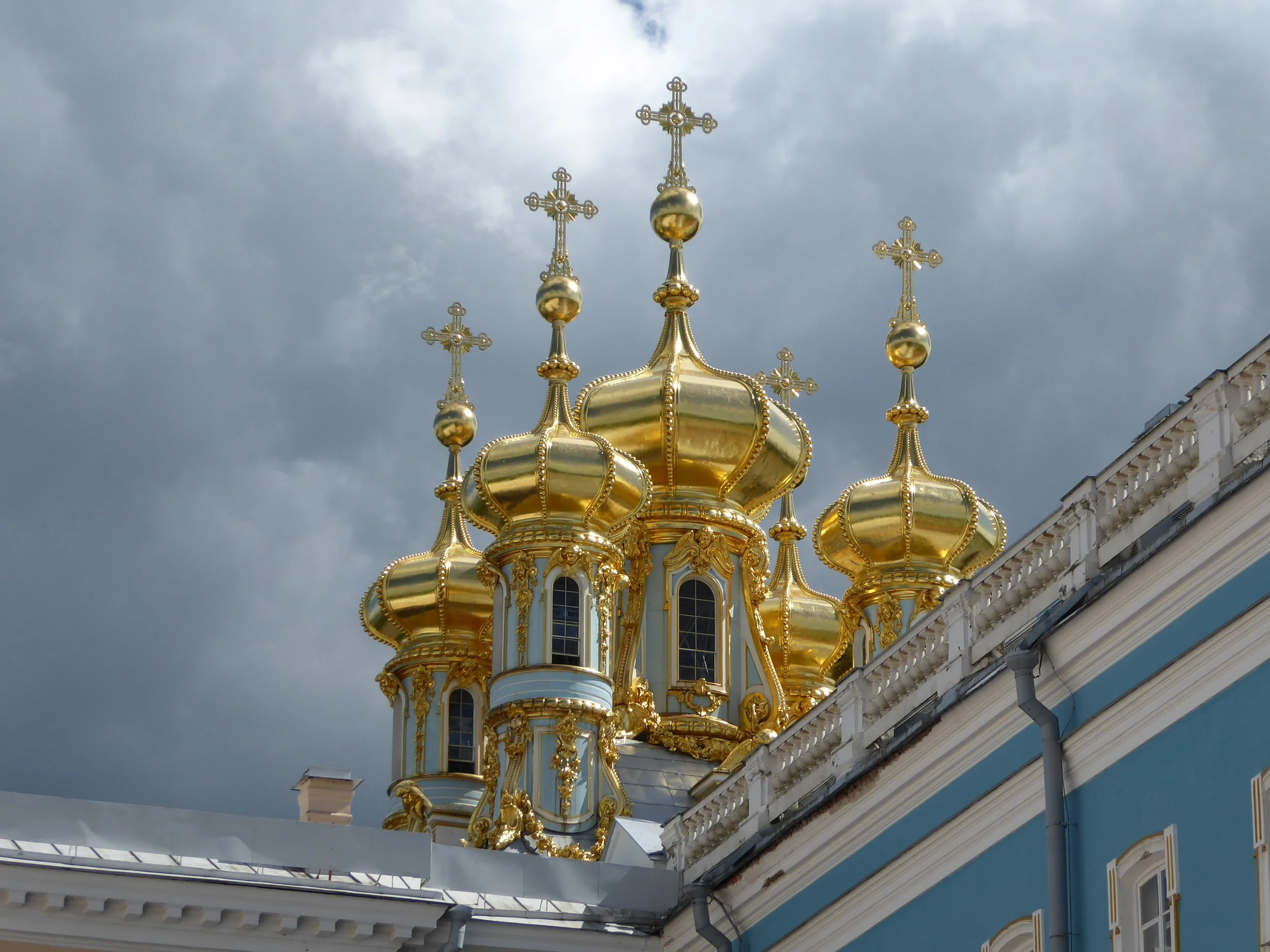 Catherine's Palace about a 1 hour drive from St. Petersburg in a pastoral countryside setting. Gold, gold, everywhere. Move over, Versailles...this place is incredible!