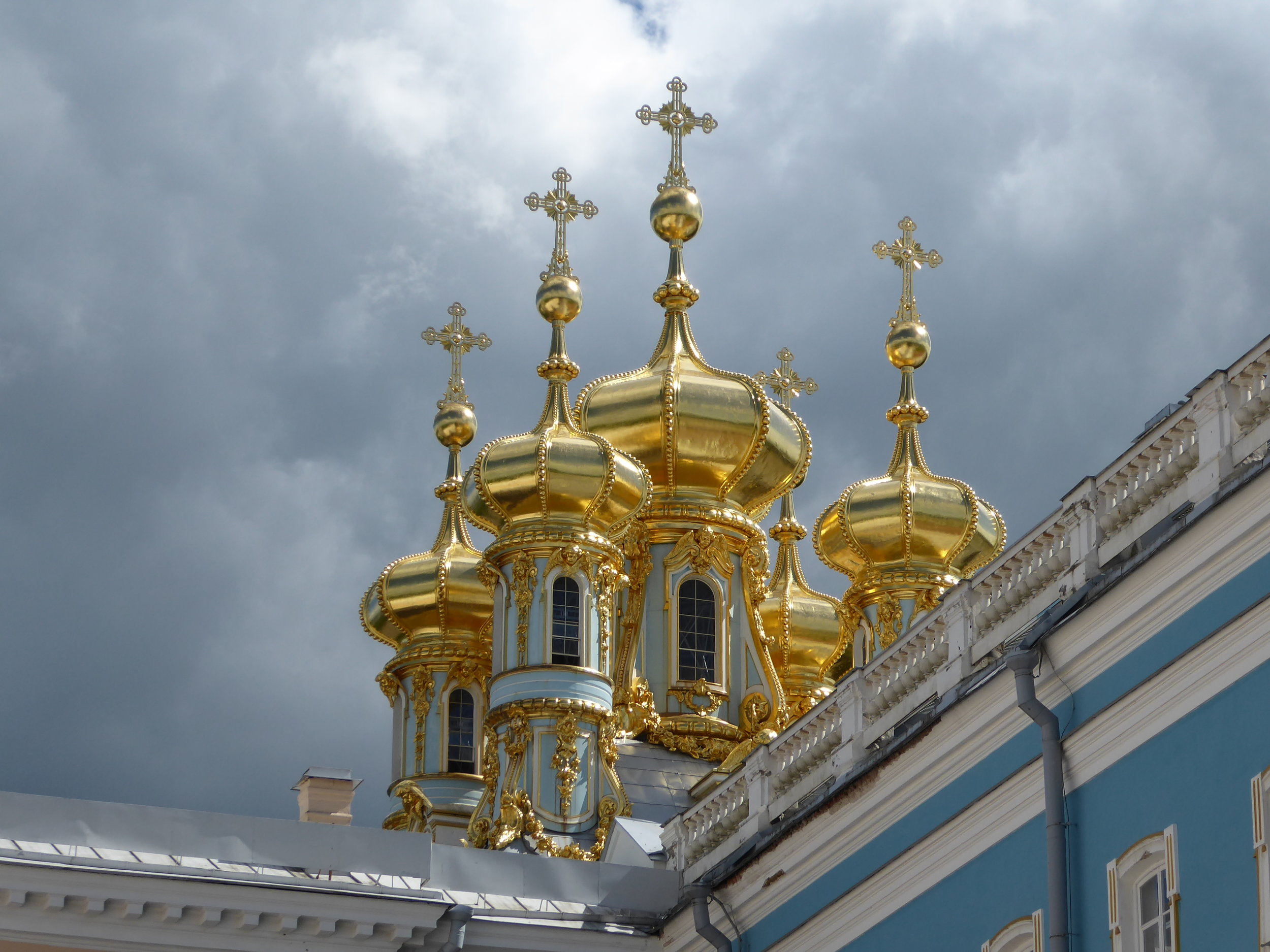 Catherine's Palace about a 1 hour drive from St. Petersburg in a pastoral countryside setting. Gold, gold, everywhere. Move over, Versailles...this place is incredible!