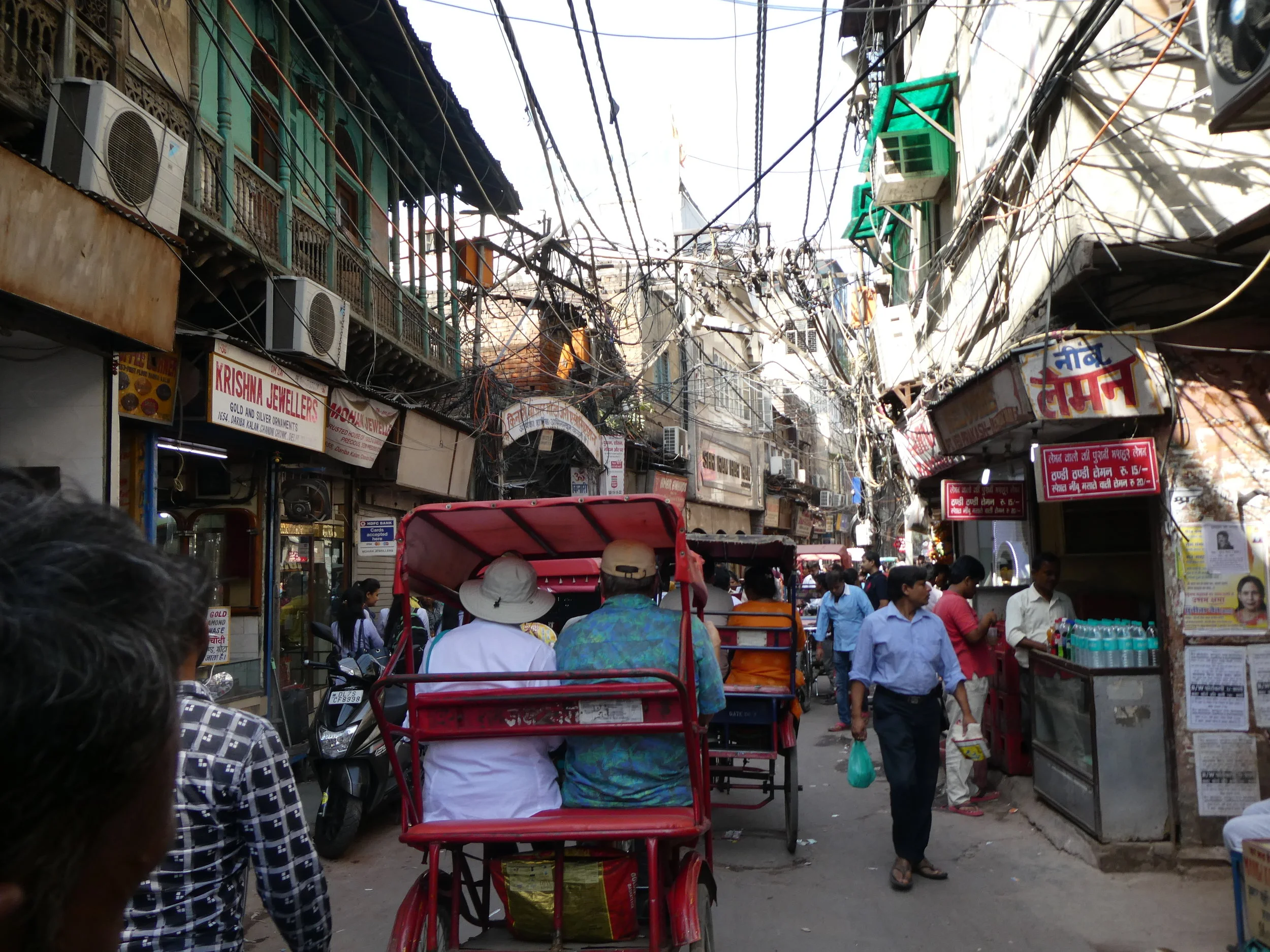 Bicycle rickshaw through Old Delhi.
