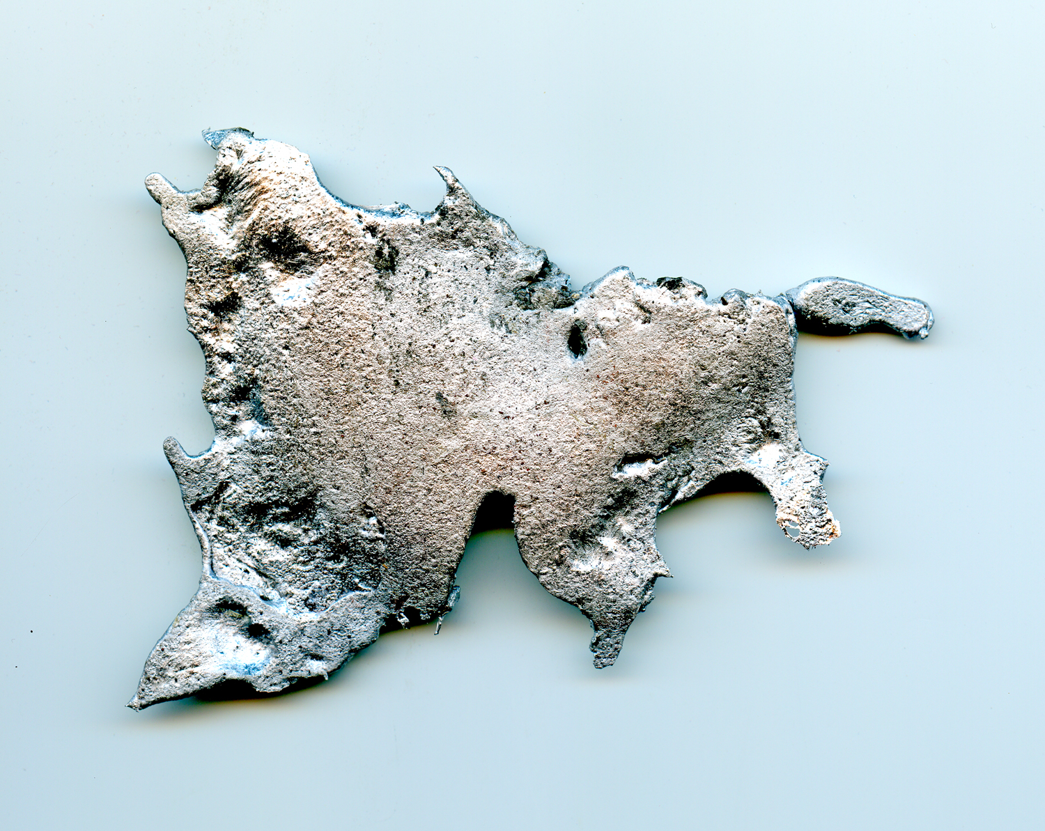 Slag created when molten aluminum is skimmed off before making the pour.