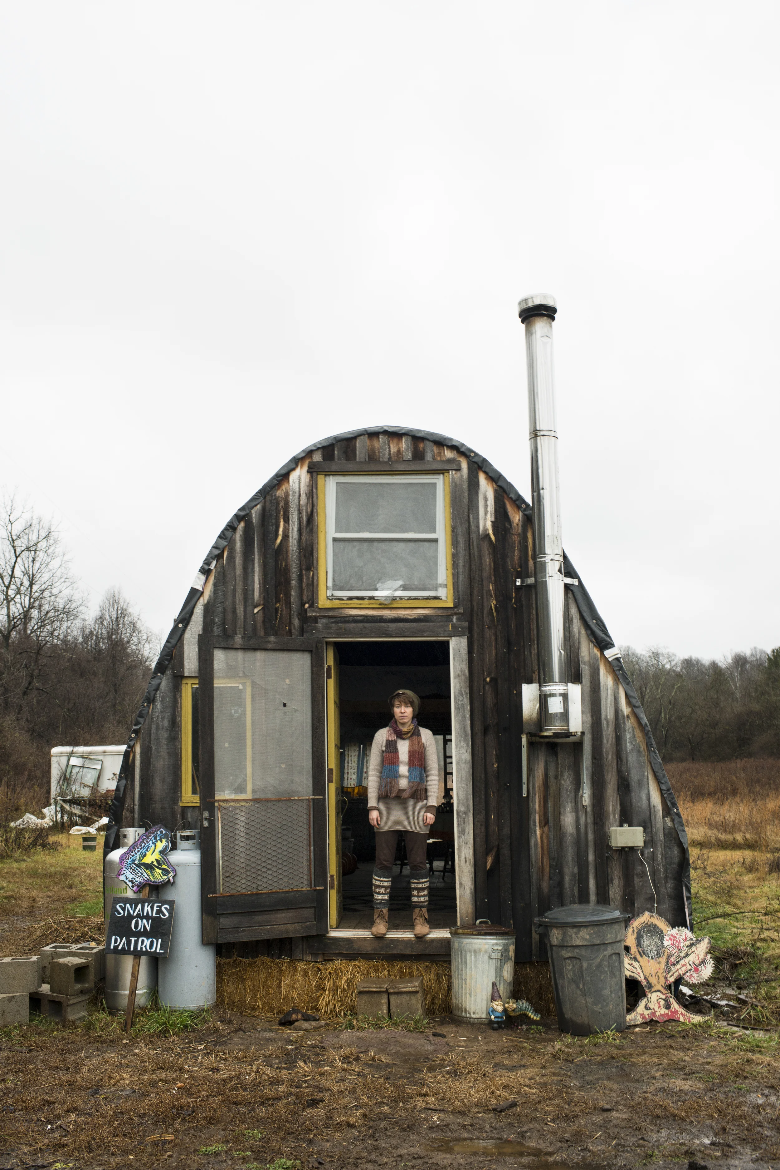  Sarah Fick poses for a portrait outside of her off-the-grid wigwam in Rutland, Ohio that she built in order to be closer to the land and escape the commodities of everyday life. "It was just this constant yearning to live more closely to the earth a