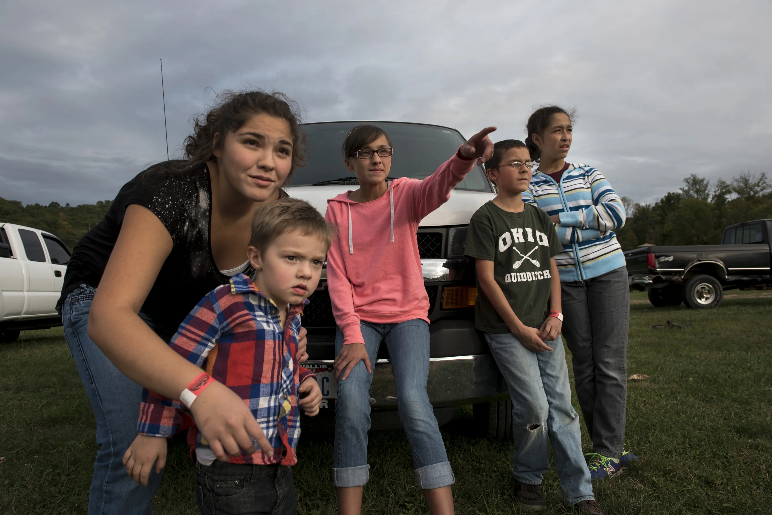  From left to right, Nina, Levi, Olivia, Sean, and Mya watch Gabe warm up for his motocross race at Fast Traxx Racing in Athens, Ohio. The whole family supports Gabe at his motocross races throughout the year. 