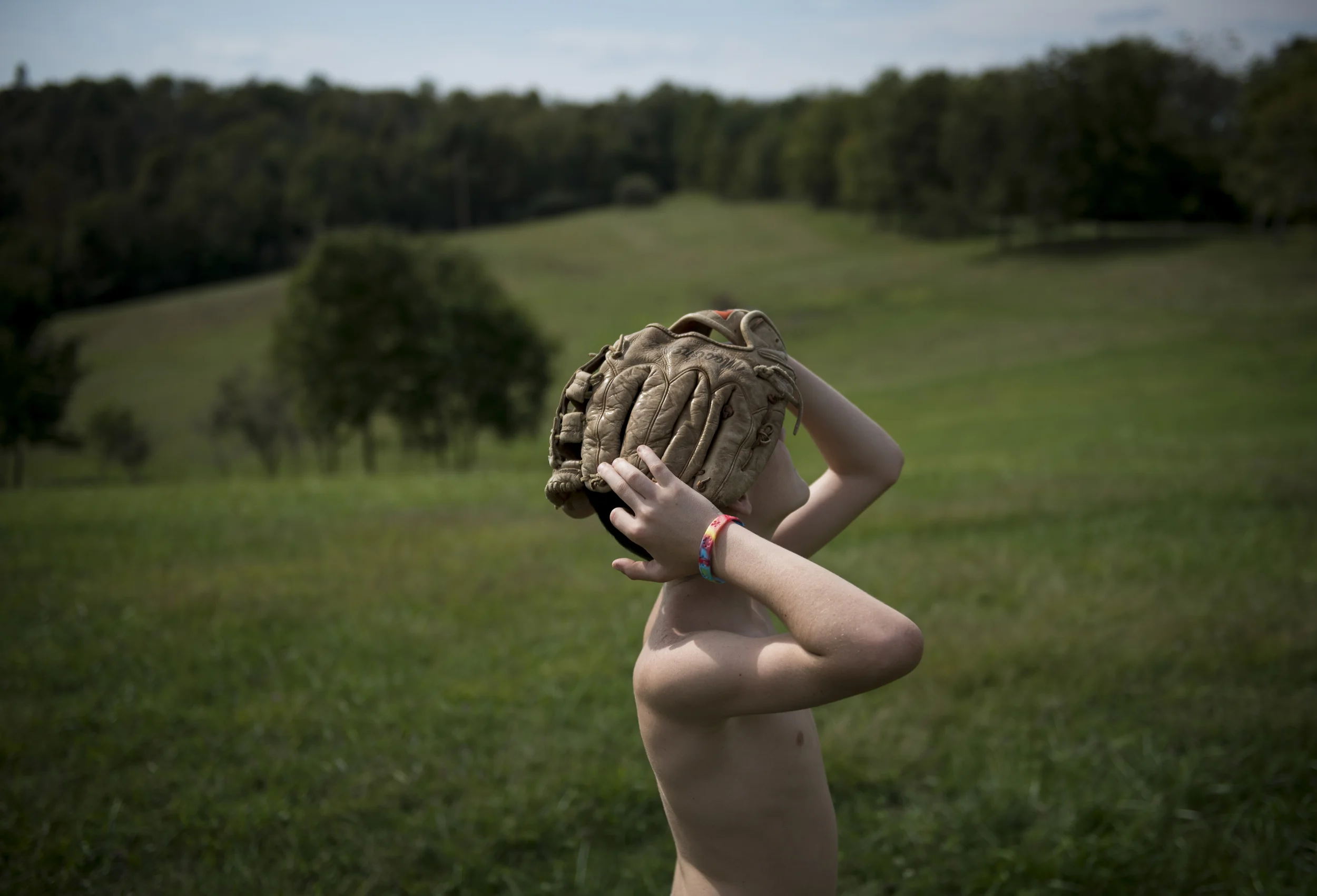  Keaton rests between pitches playing catch with his sister Nina and brother Gabe in their front yard. Keaton's caseworker told the Fullers he was on the verge of being placed in a permanent facility until the age of 18 if he couldn’t be adopted out 
