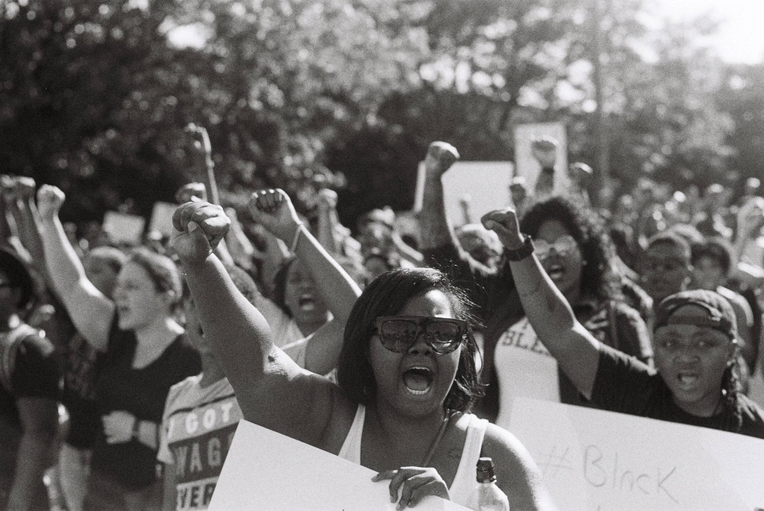 A Black Lives Matter march shut down West Broadway in the West End of Louisville in recognition of the police shooting of Philando Castile, an unarmed black male. 