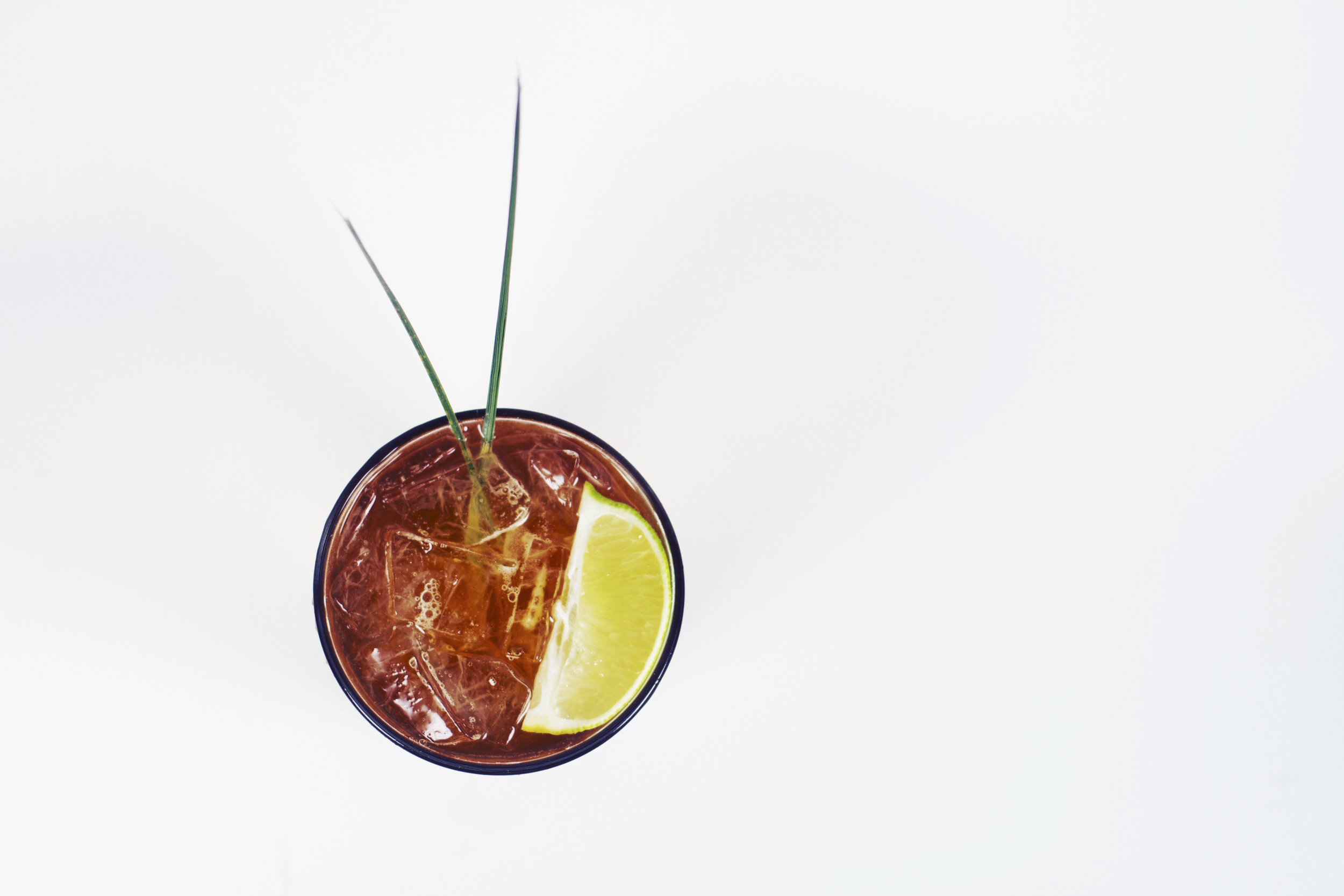 Let us take you back to the rocking chair on your grandma’s porch, swaying to the summer breeze with a glass of sweet tea in your hand. But your mama’s house has been miraculously nestled on a sun kissed beach, and your cup of sweet tea has been transformed into a bubbly ginger spiced citrus infusion. Our delicious black iced tea, house made lemongrass ginger simple syrup, Topo Chico, graced with a sprig of lemon grass and lime together take our iced tea to an enhanced level called the Lemongrass Fizz.