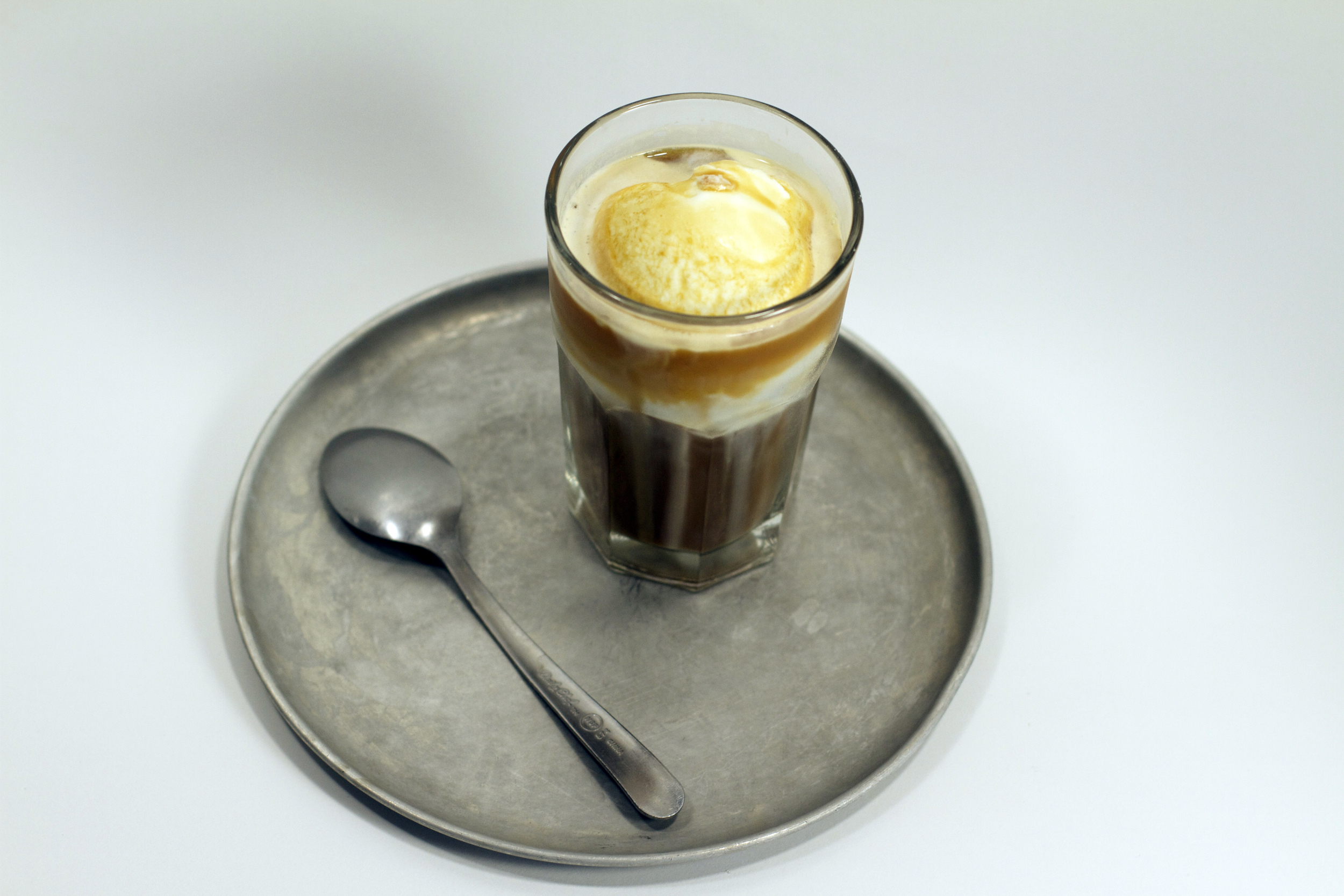 Your favorite childhood treat is all grown up! Our Cold Brew Float is a beloved reminder of summer days spent barefoot waiting for the sweet tune of the ice cream truck, paired with one of your favorite adult indulgences. A scoop of locally made gelato from STG sits afloat a sea of our Oak Aged Cold Brew, a drink that will not only brighten your day but give you the energy to get through it!