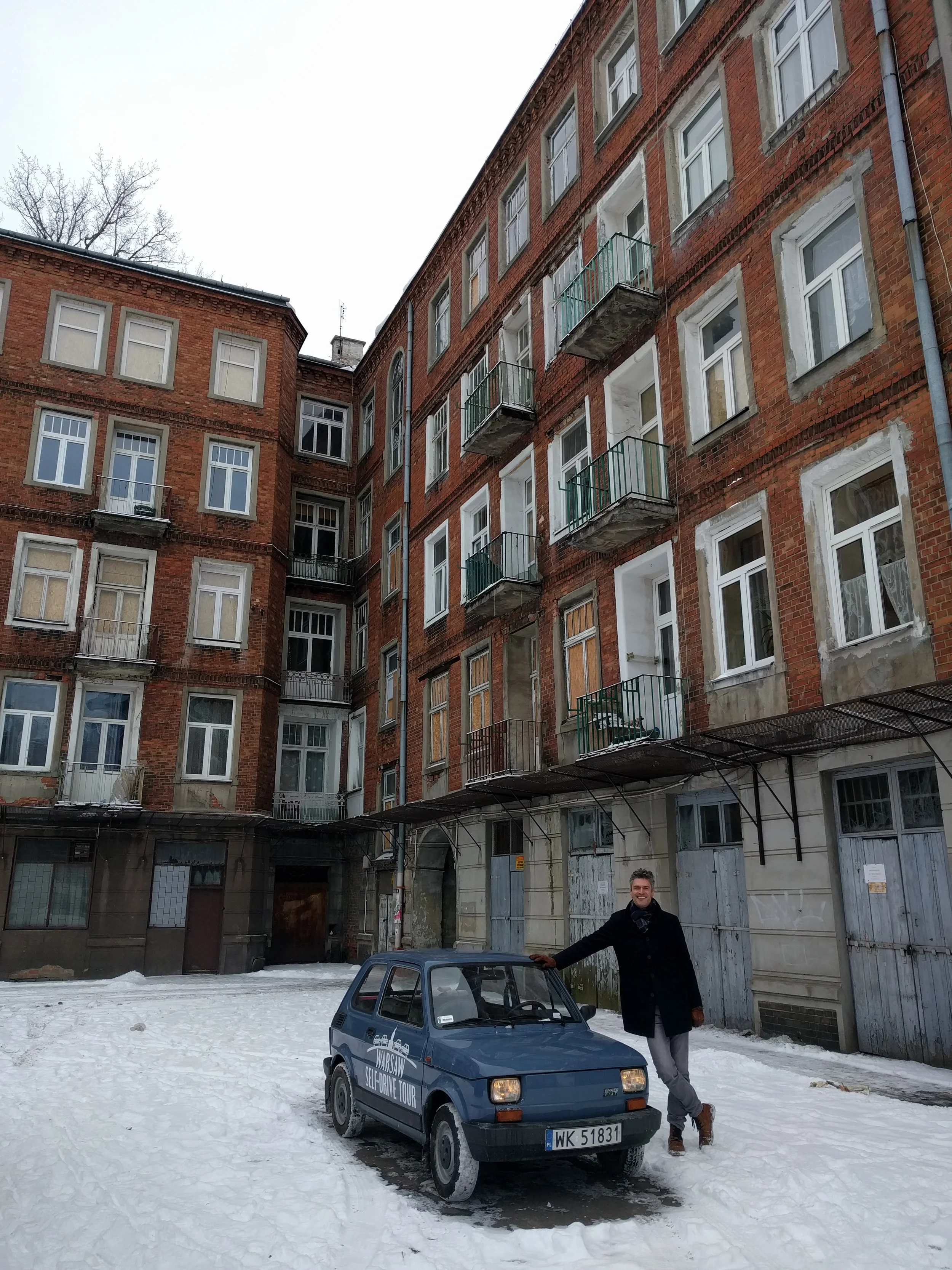 Stopped in the courtyard of a pre-communist ear building in Warsaw's Praga District.
